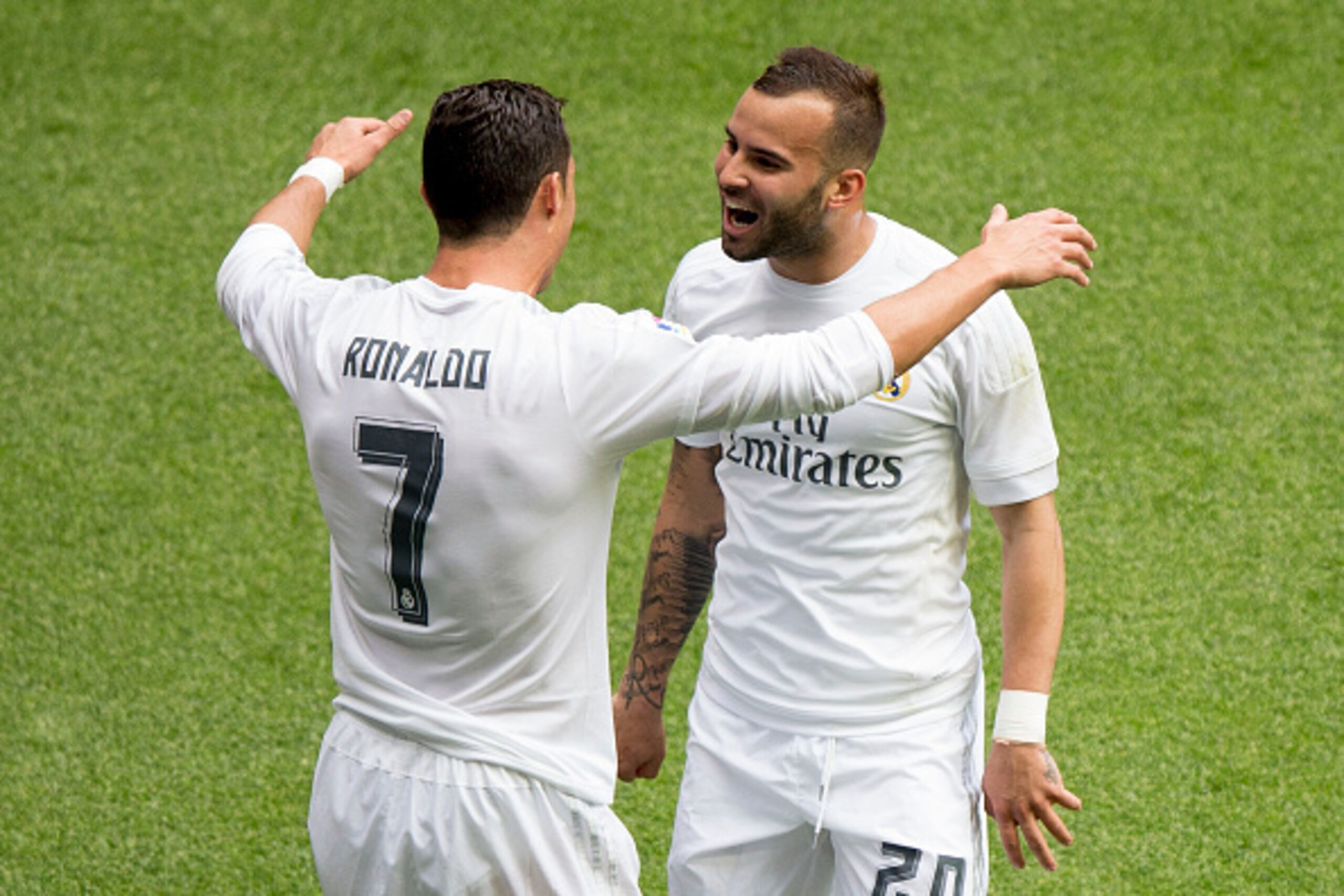 MADRID, SPAIN - APRIL 09:  Cristiano Ronaldo (L) of Real Madrid CF celebrates scoring their third goal with teammate Jese Rodriguez (R) during the La Liga match between Real Madrid CF and SD Eibar at Estadio Santiago Bernabeu on April 9, 2016 in Madrid, S