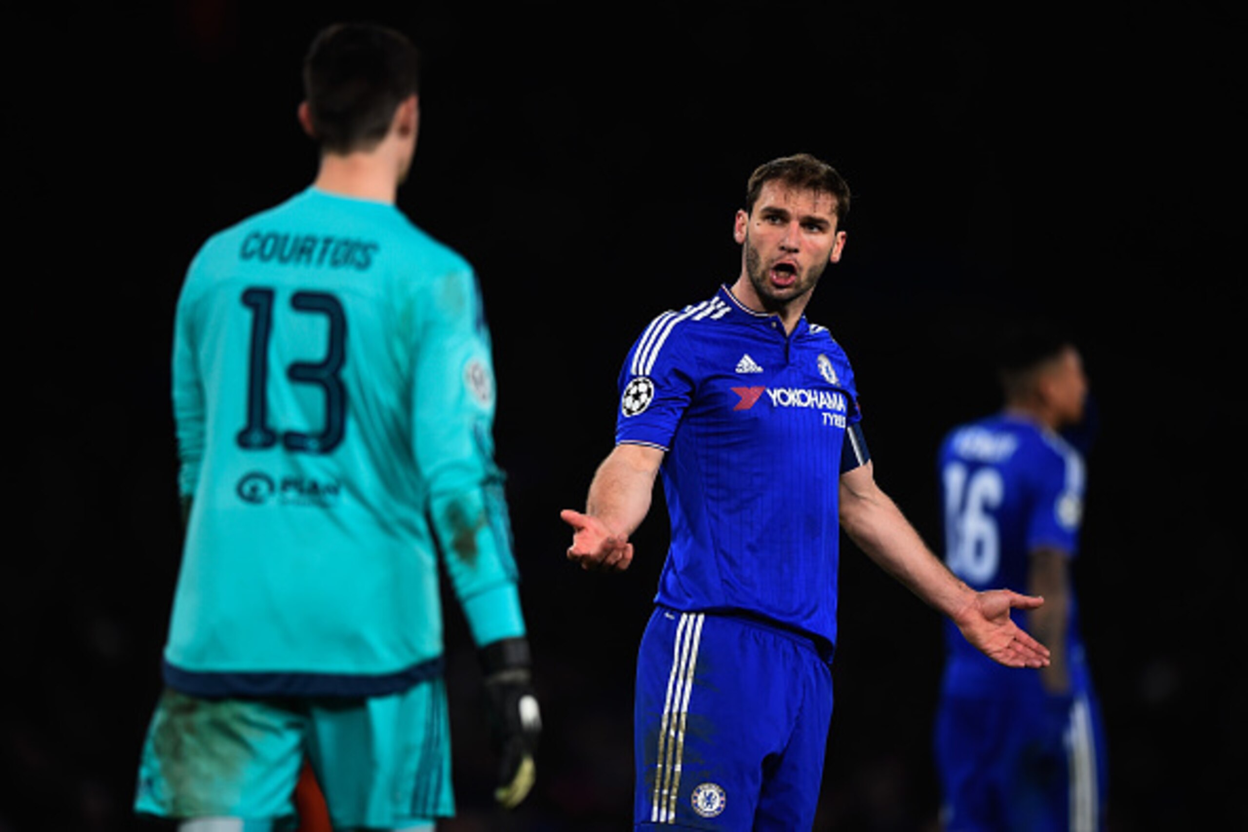LONDON, ENGLAND - MARCH 09:  Branislav Ivanovic of Chelsea remonstrates with goalkeeper Thibaut Courtois of Chelsea during the UEFA Champions League round of 16, second leg match between Chelsea and Paris Saint Germain at Stamford Bridge on March 9, 2016 