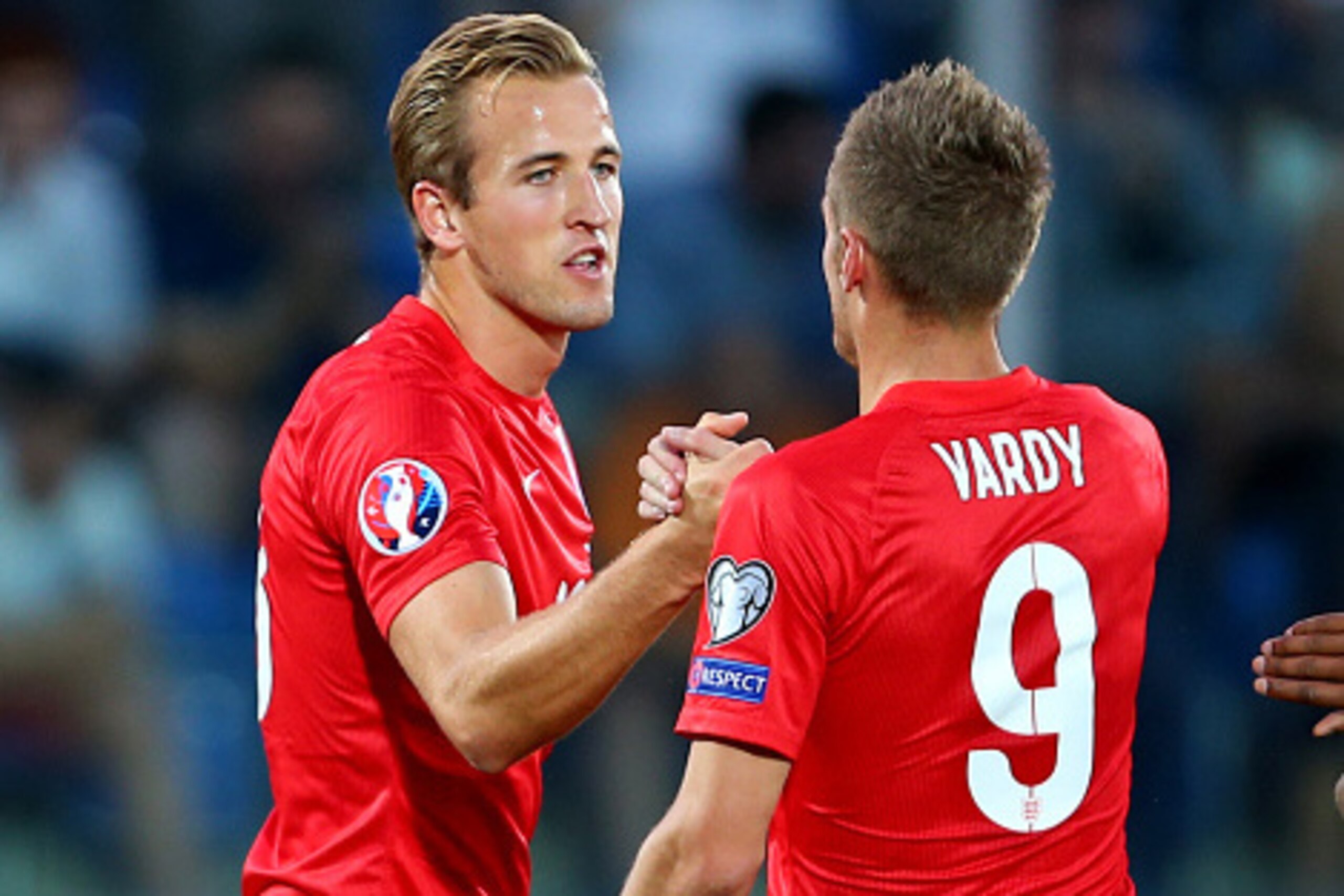 SAN MARINO, ITALY - SEPTEMBER 05:  Harry Kane of England celebrates after he scores a goal to make it 0-5 with Jamie Vardy during the UEFA Euro 2016 Qualifier Group E match between San Marino and England at Stadio Olimpico on September 5, 2015 in San Mari