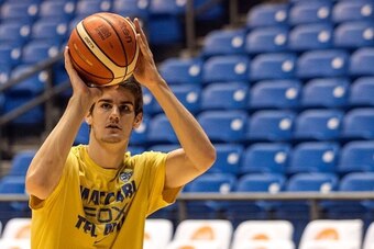 Dragan Bender, a professional Croatian basketball player currently playing for Maccabi Tel Aviv in the Israeli Basketball Super League attends a training session at the Menora Mivtachim Arena in Tel Aviv on March 16, 2016.
Bender's name is not yet well kn