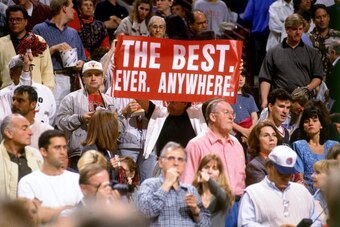 CHICAGO - JUNE 16:  Chicago Bulls fans cheer on their team in Game Six of the 1996 NBA Finals against the Seattle SuperSonics at the United Center on June 16, 1996 in Chicago Iillinois.  The Bulls won 87-75. NOTE TO USER: User expressly acknowledges that,