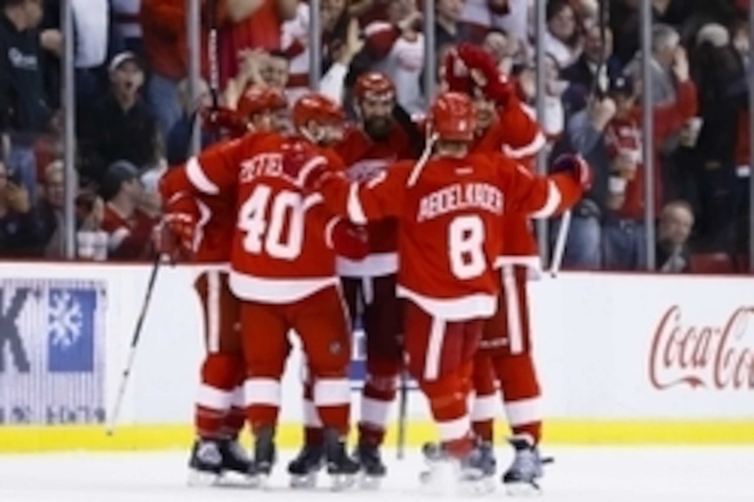Apr 6, 2016; Detroit, MI, USA; Detroit Red Wings defenseman Kyle Quincey (center) receives congratulations from after scoring in the third period against the Philadelphia Flyers at Joe Louis Arena. Detroit won 3-0. Mandatory Credit: Rick Osentoski-USA TOD Apr 6, 2016; Detroit, MI, USA; Detroit Red Wings defenseman Kyle Quincey (center) receives congratulations from after scoring in the third period against the Philadelphia Flyers at Joe Louis Arena. Detroit won 3-0. Mandatory Credit: Rick Osentoski-USA TOD