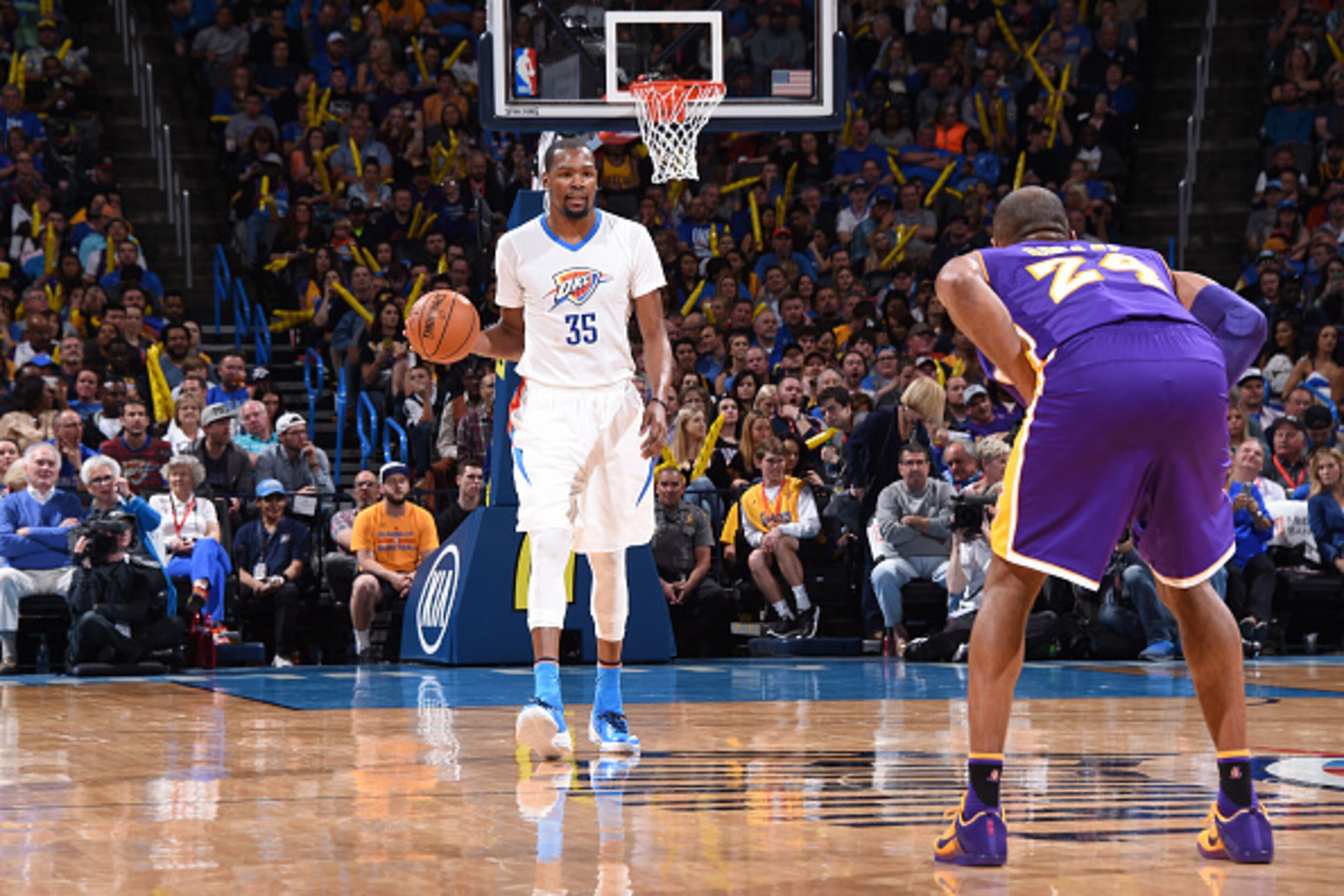 LOS ANGELES, CA - APRIL 11: Kevin Durant #35 of the Oklahoma City Thunder handles the ball against Kobe Bryant #24 the Los Angeles Lakers on April 11, 2016  at the Chesapeake Energy Arena in Oklahoma City, Oklahoma. NOTE TO USER: User expressly acknowledg