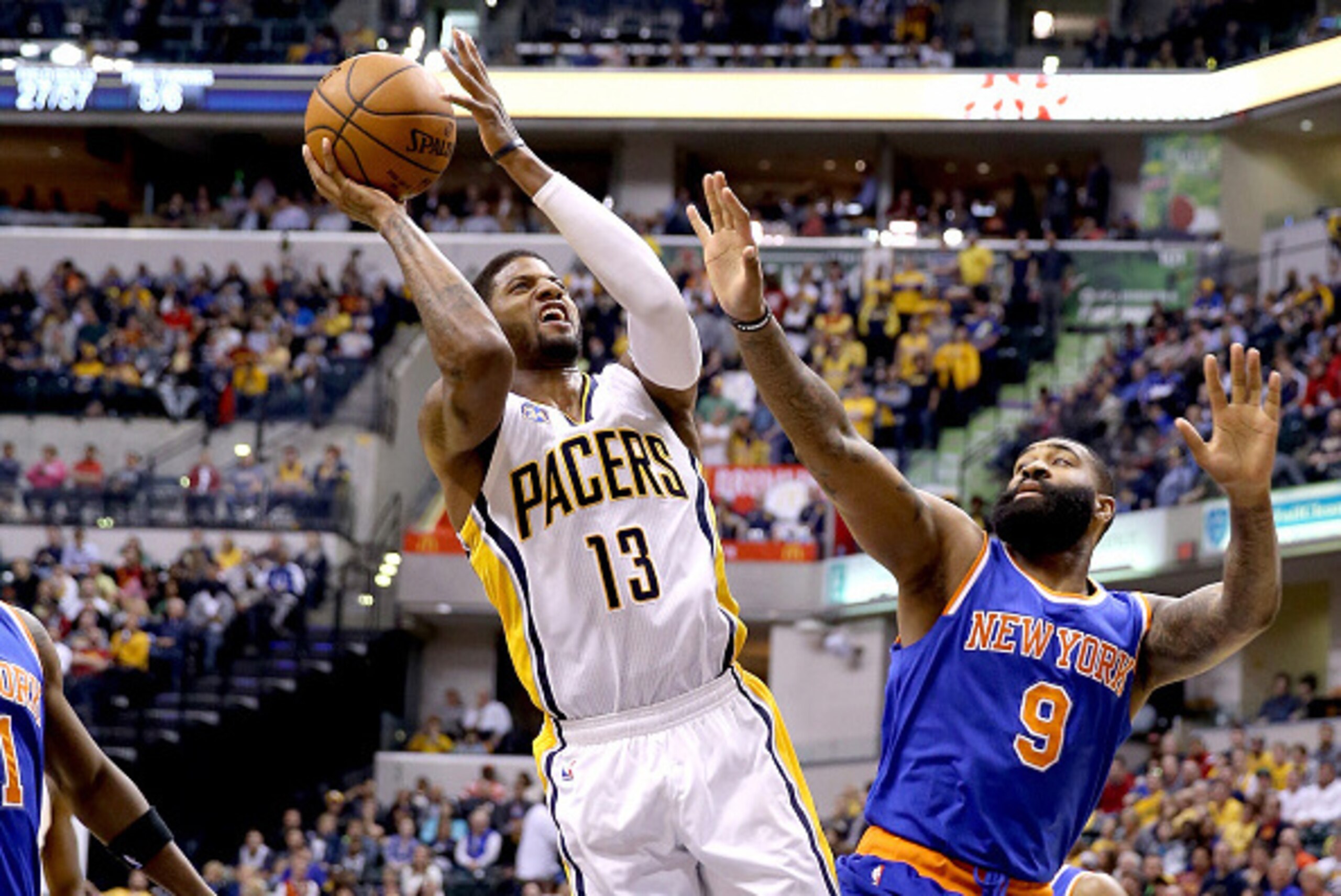 INDIANAPOLIS, INDIANA - APRIL 12:  Paul George #13 of the Indiana Pacers shoots the ball during the game against the New York Knicks at Bankers Life Fieldhouse on April 12, 2016 in Indianapolis, Indiana.  NOTE TO USER: User expressly acknowledges and agre