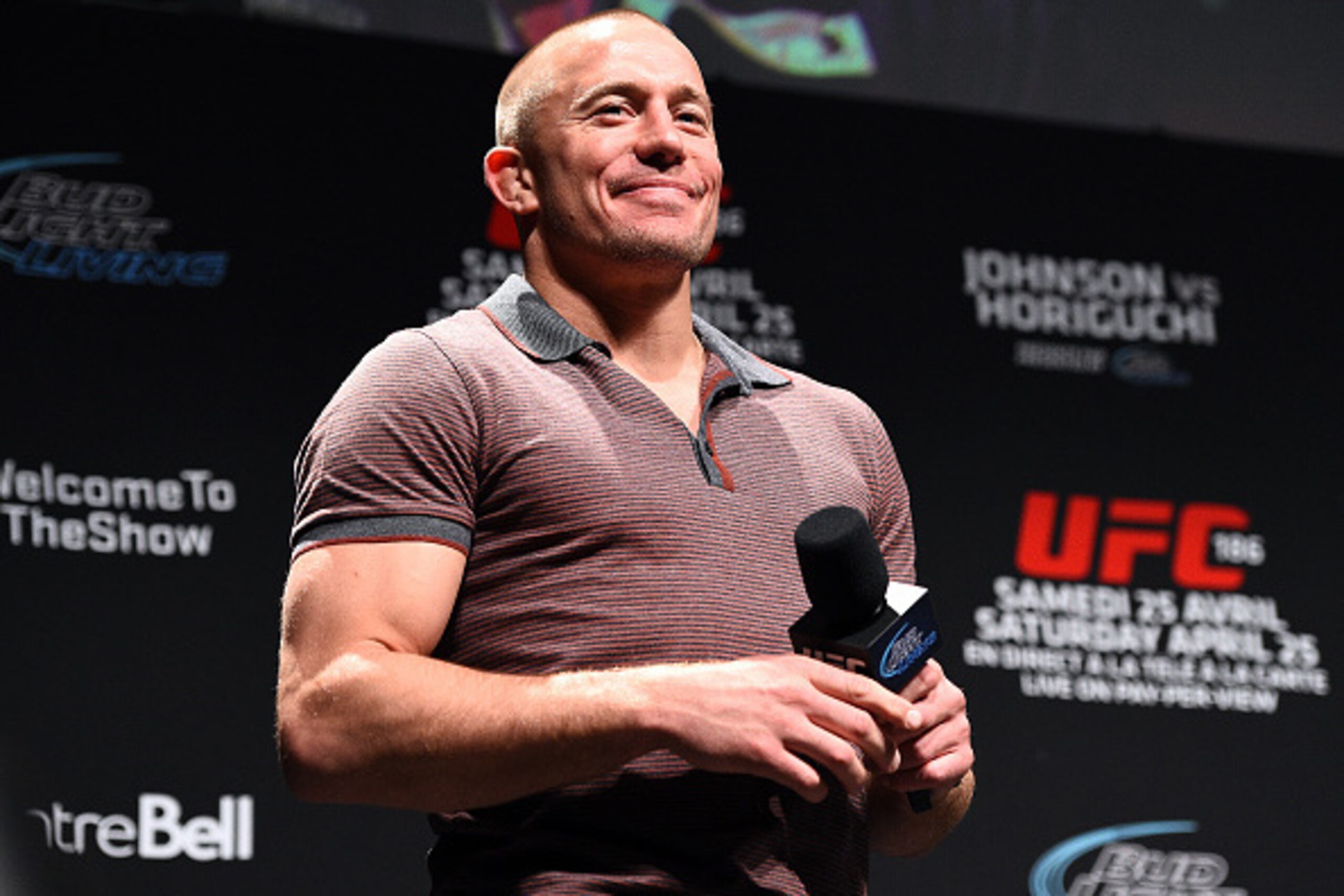 MONTREAL, QC - APRIL 24:  Former UFC welterweight champion Georges St-Pierre interacts with fans during a Q&A session before the UFC 186 weigh-in event at Metropolis on April 24, 2015 in Montreal, Quebec, Canada. (Photo by Jeff Bottari/Zuffa LLC/Zuffa LLC