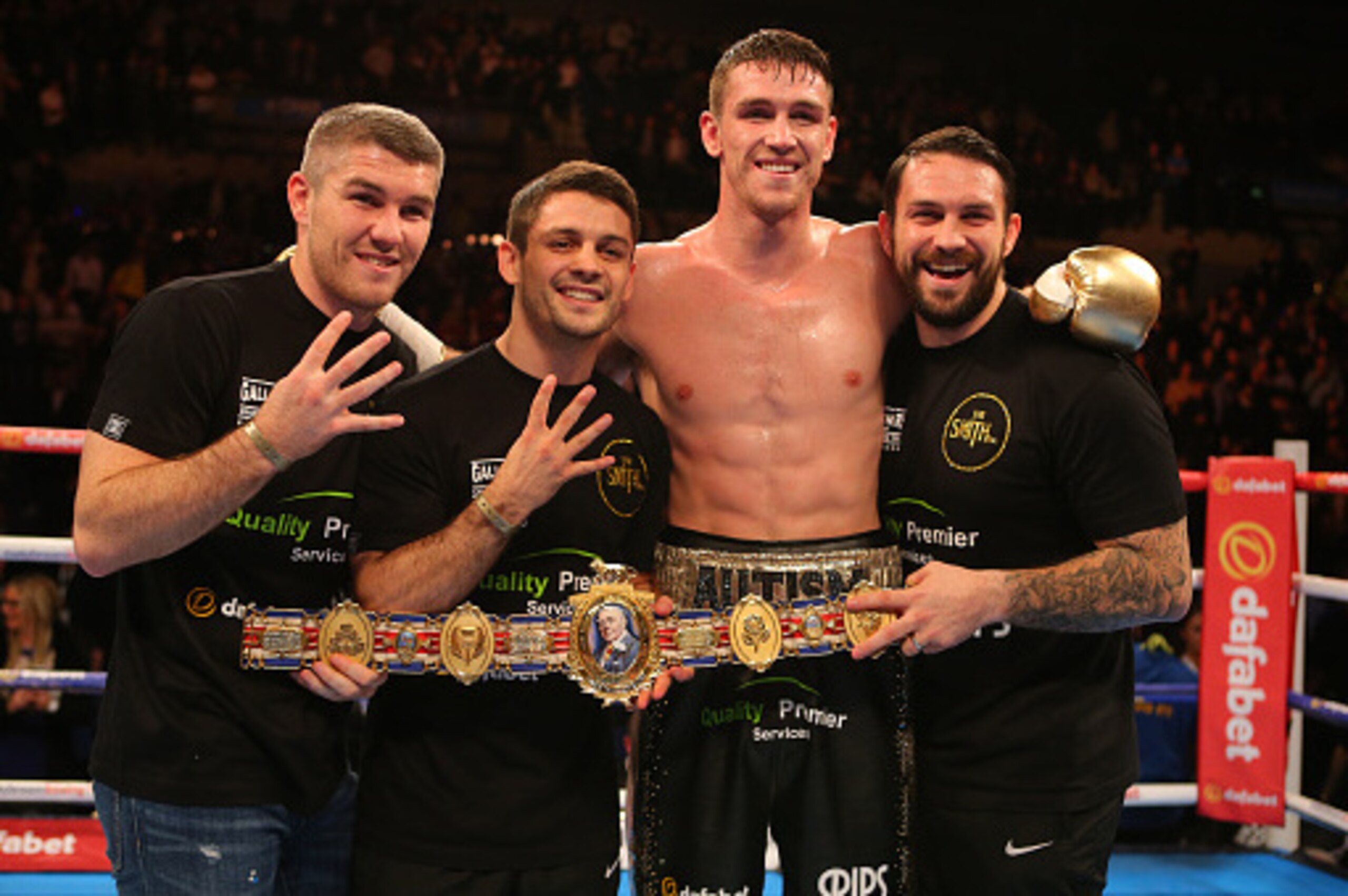 LIVERPOOL, ENGLAND - NOVEMBER 7: Callum Smith stands alongside brothers (left to right) Liam, Stephen and Paul Smith, after beating Rocky Fielding during their Super Middleweight contest at the Echo Arena on November 7, 2015 in Liverpool, England. (Photo 