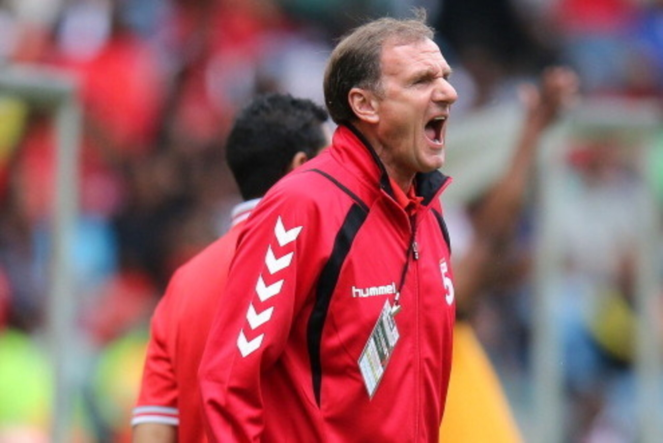 DURBAN, SOUTH AFRICA - NOVEMBER 16: In this handout image provided by the ITM Group,   Phil Thompson of Liverpool Legends makes a point during the Legends match between Liverpool FC Legends and Kaizer Chiefs Legends at Moses Mabhida Stadium on November 16