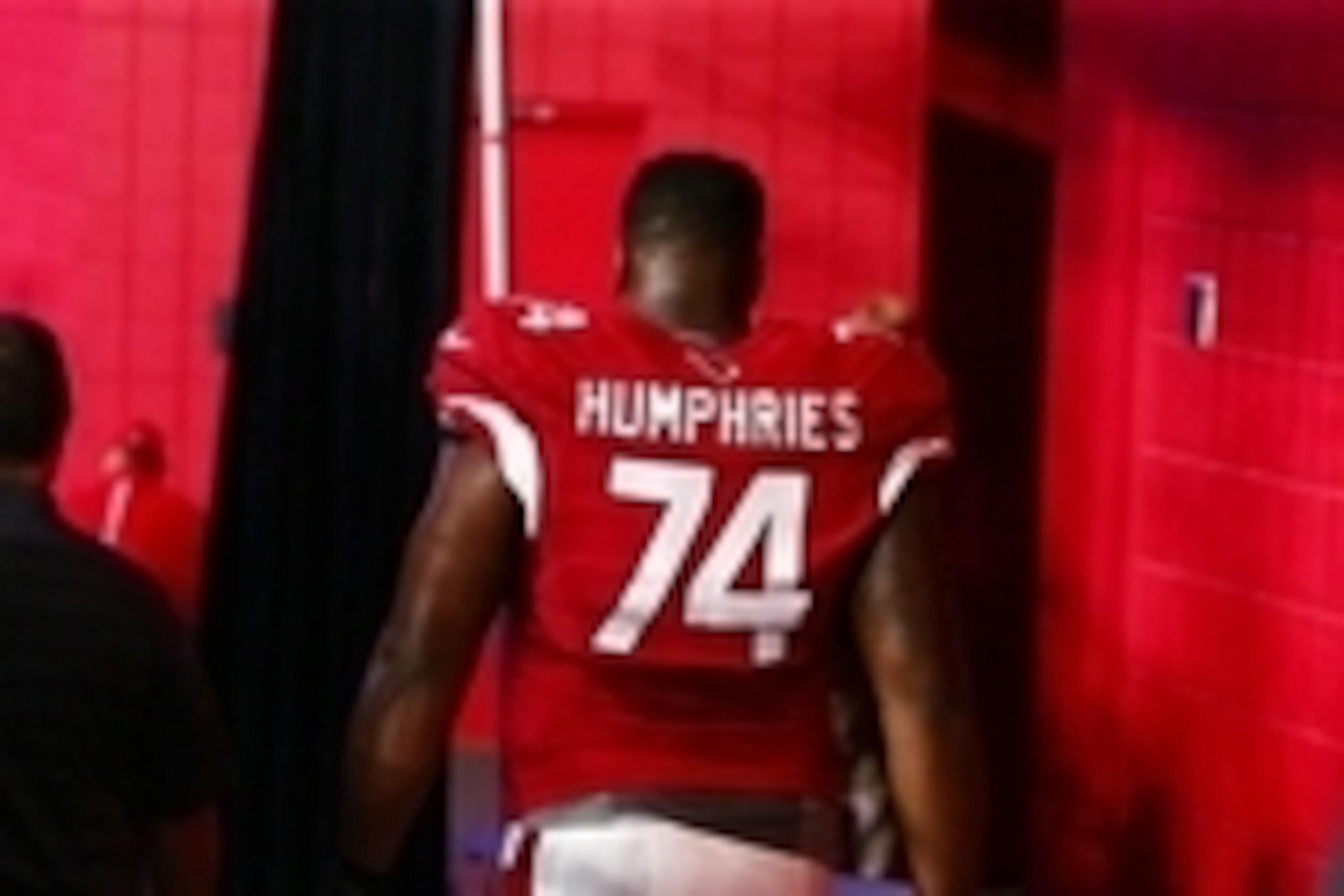 Aug 15, 2015; Glendale, AZ, USA; Arizona Cardinals tackle D.J. Humphries (74) heads to the locker room after suffering an injury against the Kansas City Chiefs in a preseason NFL football game at University of Phoenix Stadium. Mandatory Credit: Mark J. Re