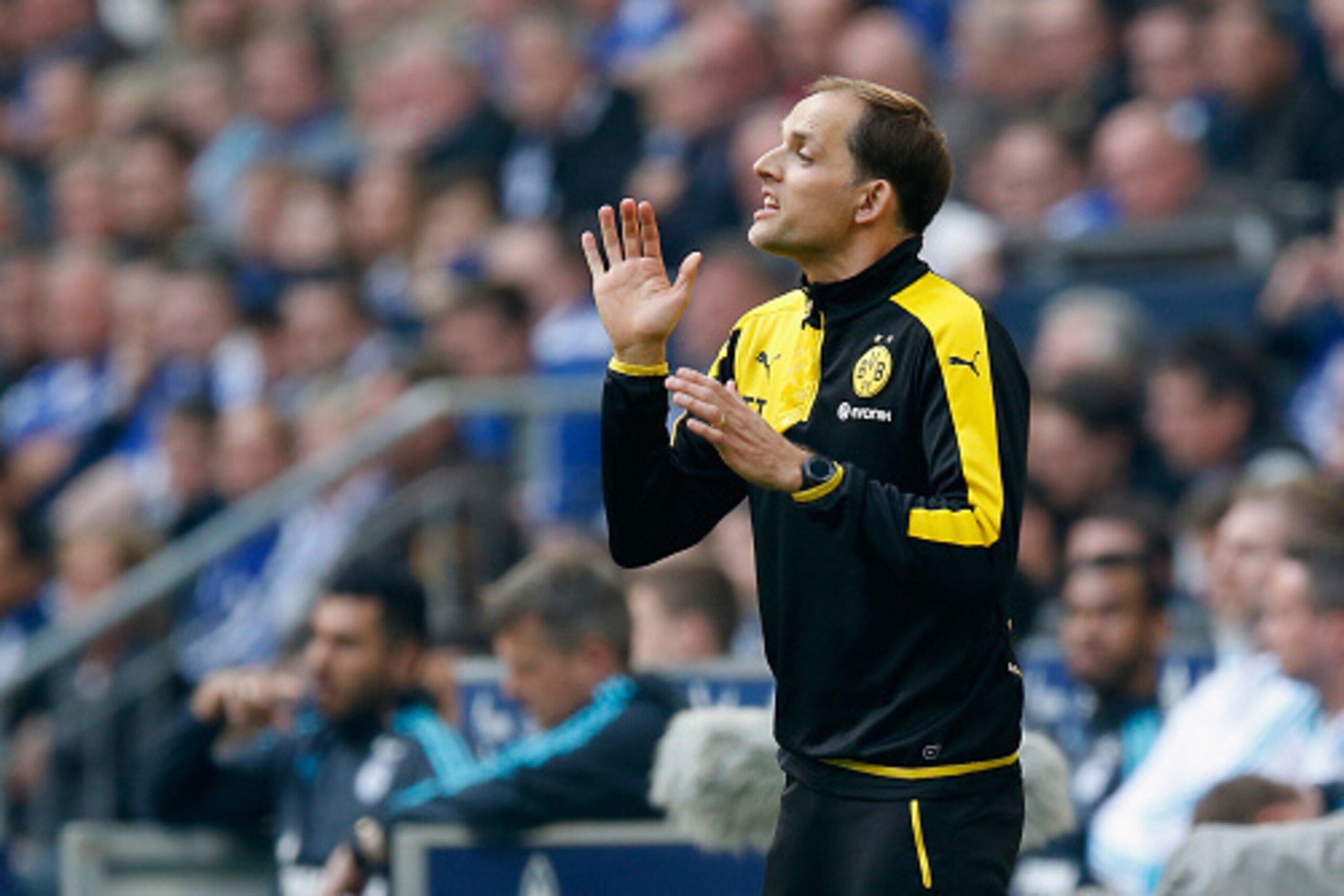 GELSENKIRCHEN, NORTH RHINE-WESTPHALIA - APRIL 10:  Head coach Thomas Tuchel of Borussia Dortmund gestures during the Bundesliga match between FC Schalke 04 and Borussia Dortmund at Veltins-Arena on April 10, 2016 in Gelsenkirchen, Germany.  (Photo by Bori