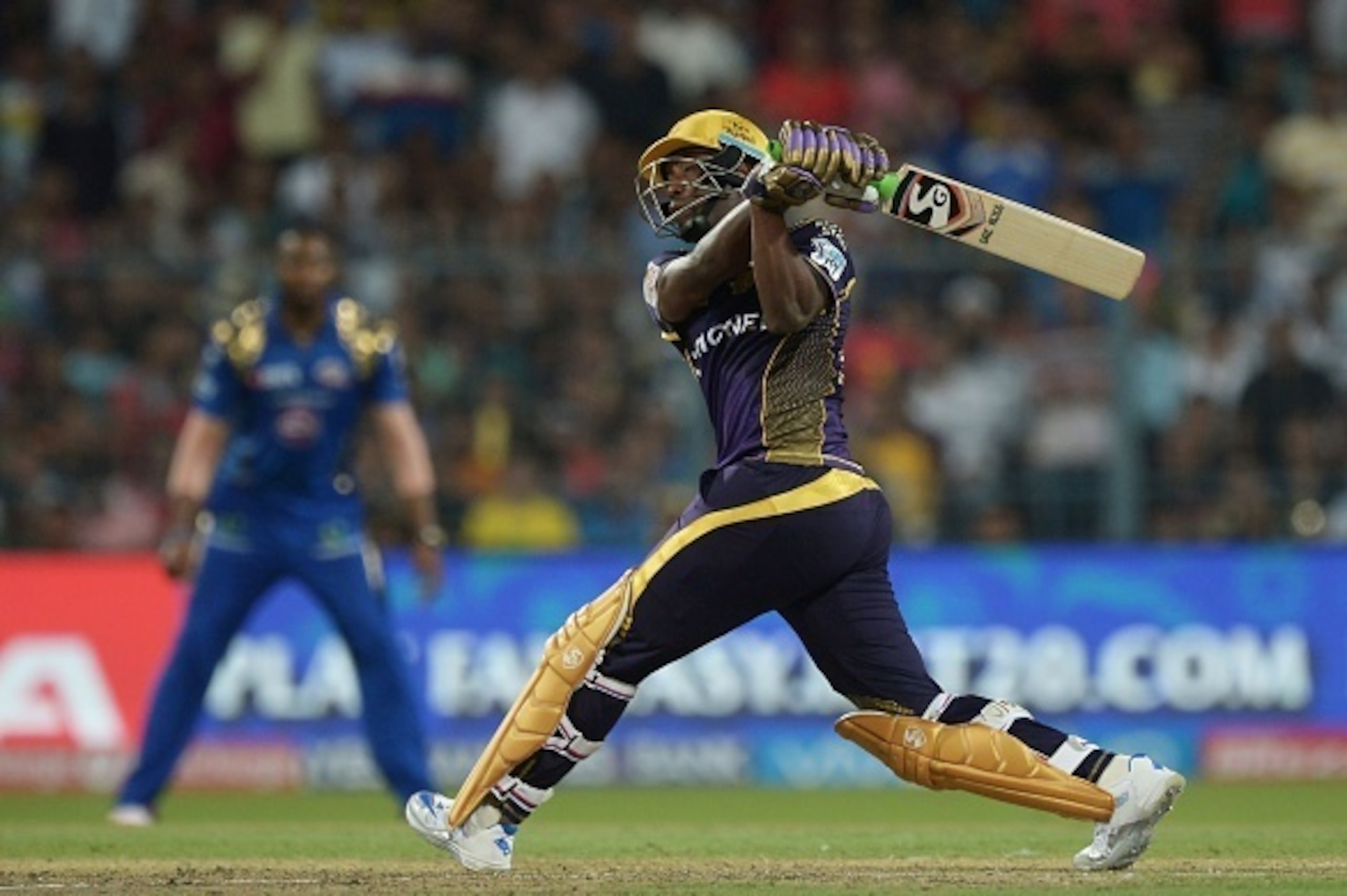 Kolkata Knight Riders cricketer Andre Russell plays a shot during the 2016 Indian Premier League (IPL) Twenty20 cricket match between Kolkata Knight Riders and Mumbai Indians at the Eden Gardens Cricket Stadium in Kolkata on April 13, 2016. ---- IMAGE RES