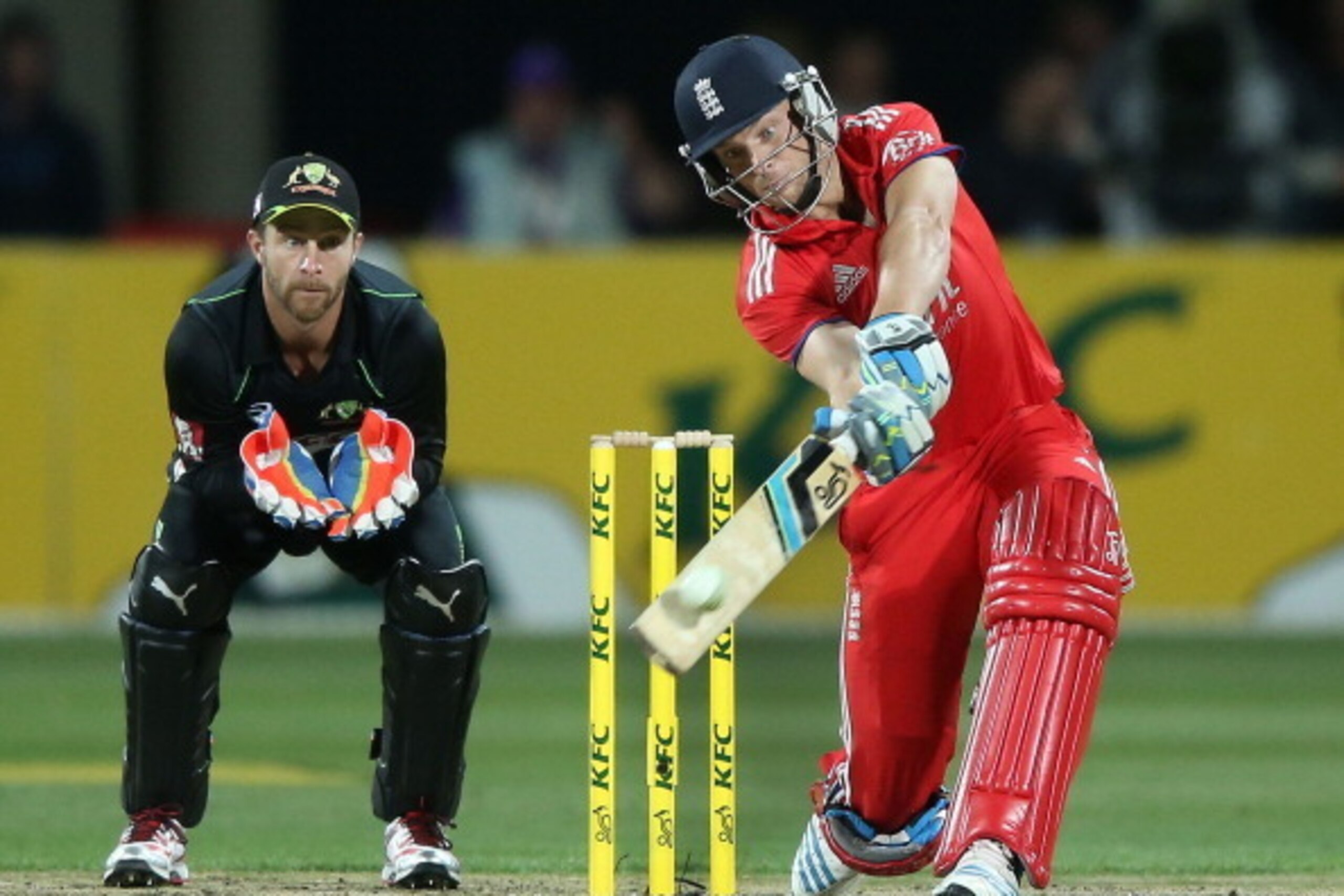 HOBART, AUSTRALIA - JANUARY 29: Joss Buttler of England hits a boundary during game one of the International Twenty20 series between Australia and England at Blundstone Arena on January 29, 2014 in Hobart, Australia.  (Photo by Michael Dodge/Getty Images)