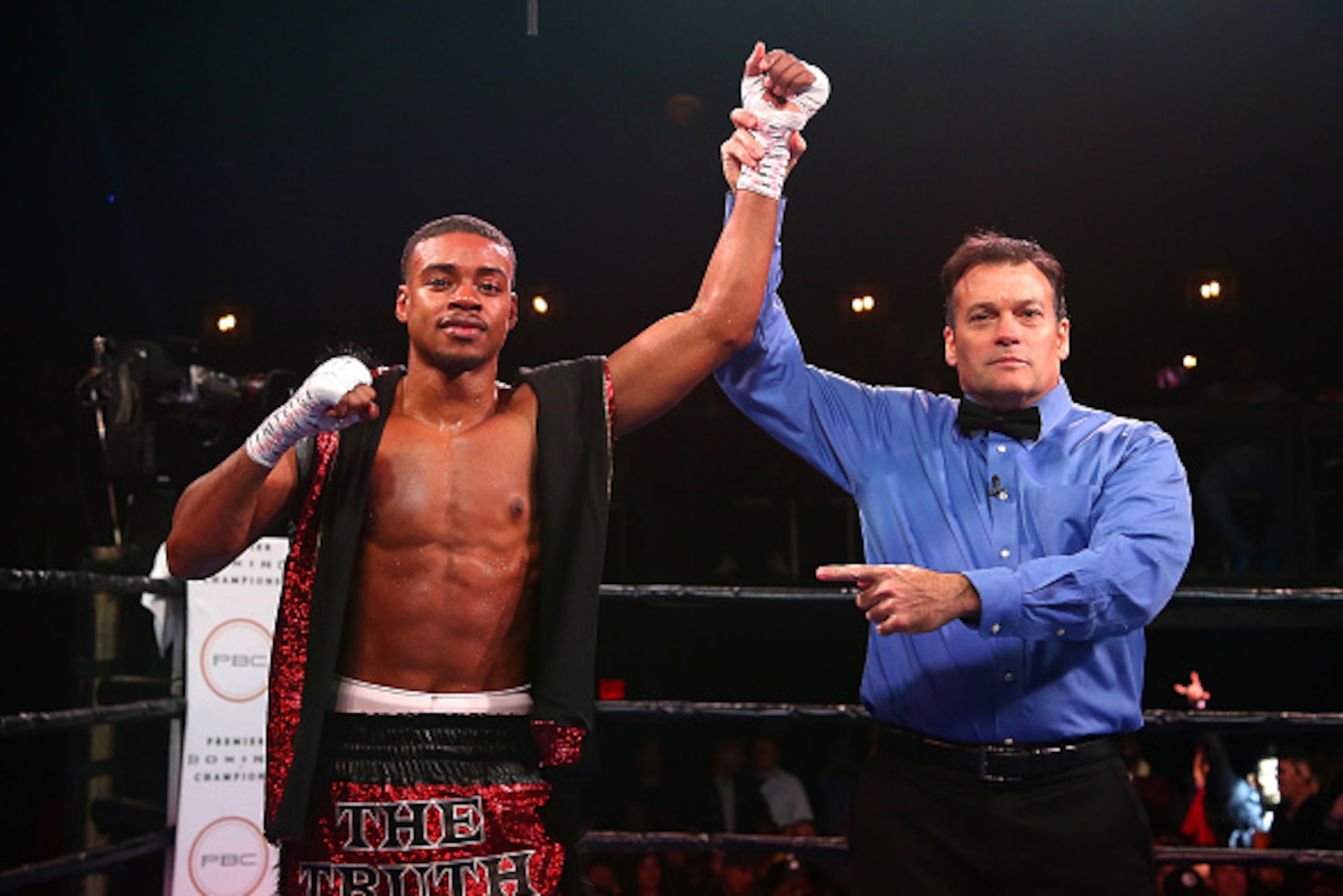 DALLAS, TX - NOVEMBER 28:  Welterweight fighter Errol Spence Jr. celebrates after knocking out Alejandro Barrera during the Premier Boxing Champions at Bomb Factory on November 28, 2015 in Dallas, Texas.  (Photo by Sarah Crabill/Getty Images)