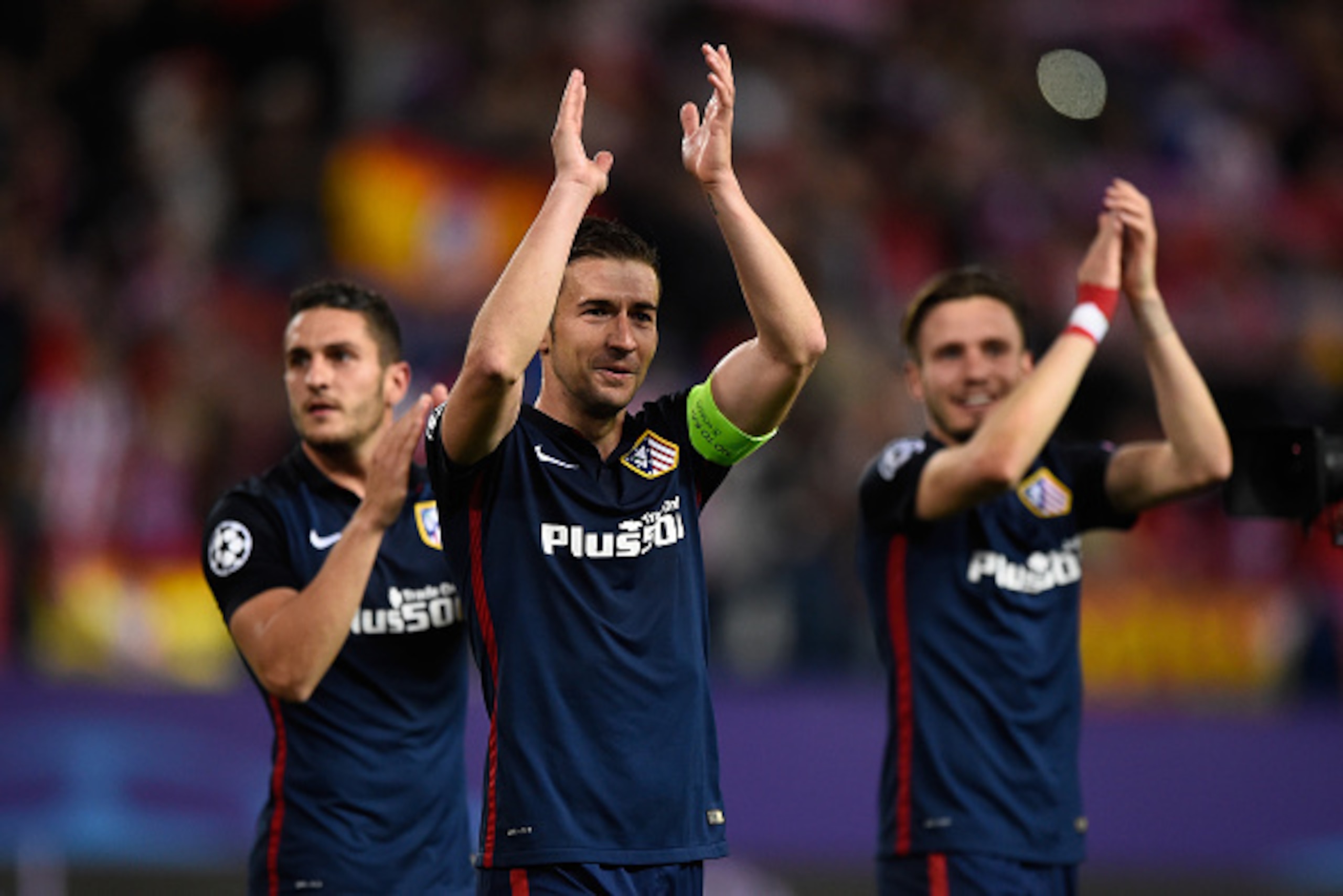 MADRID, SPAIN - APRIL 13: Gabi of Atletico Madrid celebrates with team mates after the UEFA Champions League quarter final, second leg match between Club Atletico de Madrid and FC Barcelona at the Vincente Calderon on April 13, 2016 in Madrid, Spain. (Ph MADRID, SPAIN - APRIL 13: Gabi of Atletico Madrid celebrates with team mates after the UEFA Champions League quarter final, second leg match between Club Atletico de Madrid and FC Barcelona at the Vincente Calderon on April 13, 2016 in Madrid, Spain. (Ph