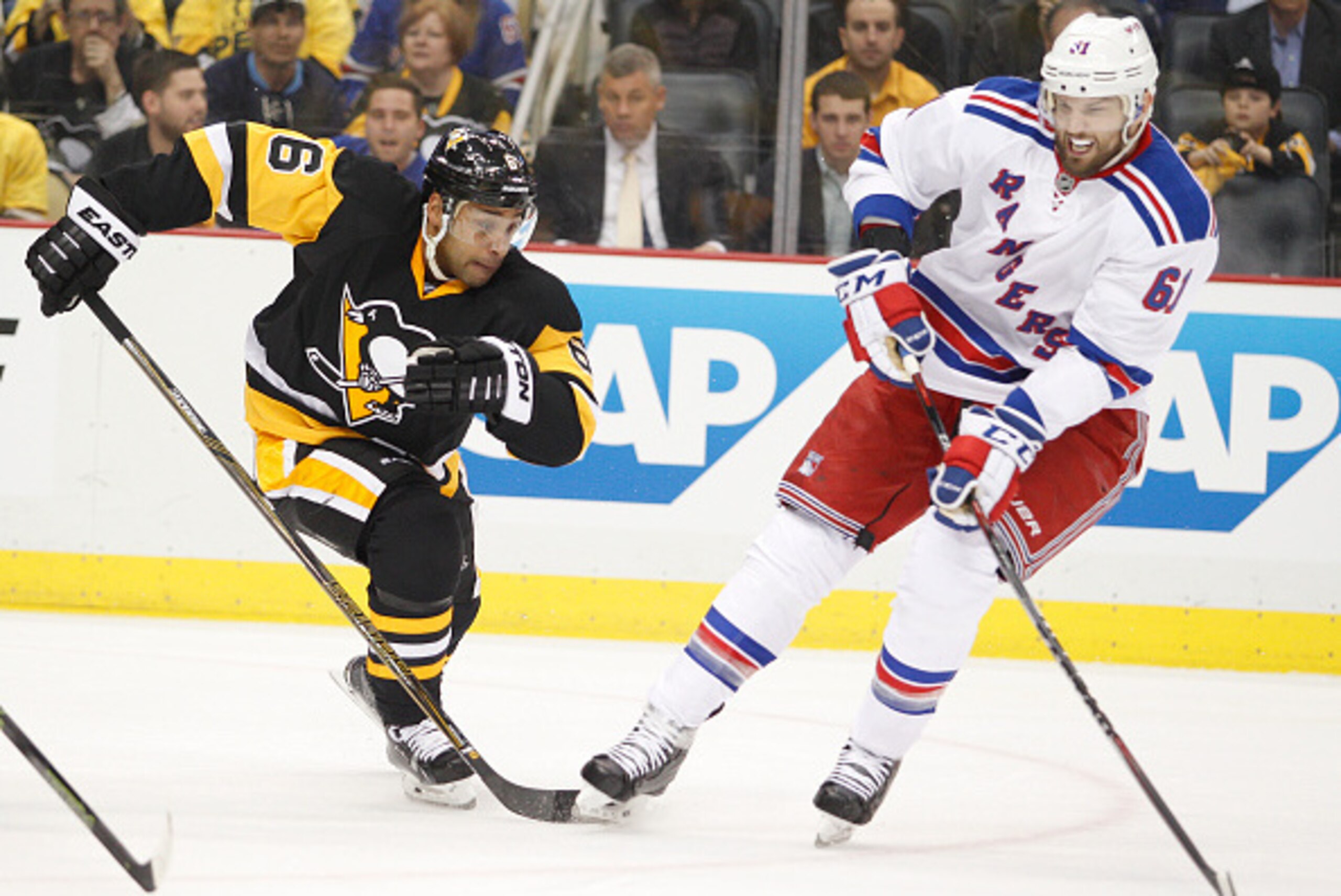 PITTSBURGH, PA - APRIL 13: Rick Nash #61 of the New York Rangers shoots the puck against Trevor Daley #6 of the Pittsburgh Penguins in Game One of the Eastern Conference Quarterfinals during the 2016 NHL Stanley Cup Playoffs at Consol Energy Center on Ap PITTSBURGH, PA - APRIL 13: Rick Nash #61 of the New York Rangers shoots the puck against Trevor Daley #6 of the Pittsburgh Penguins in Game One of the Eastern Conference Quarterfinals during the 2016 NHL Stanley Cup Playoffs at Consol Energy Center on Ap