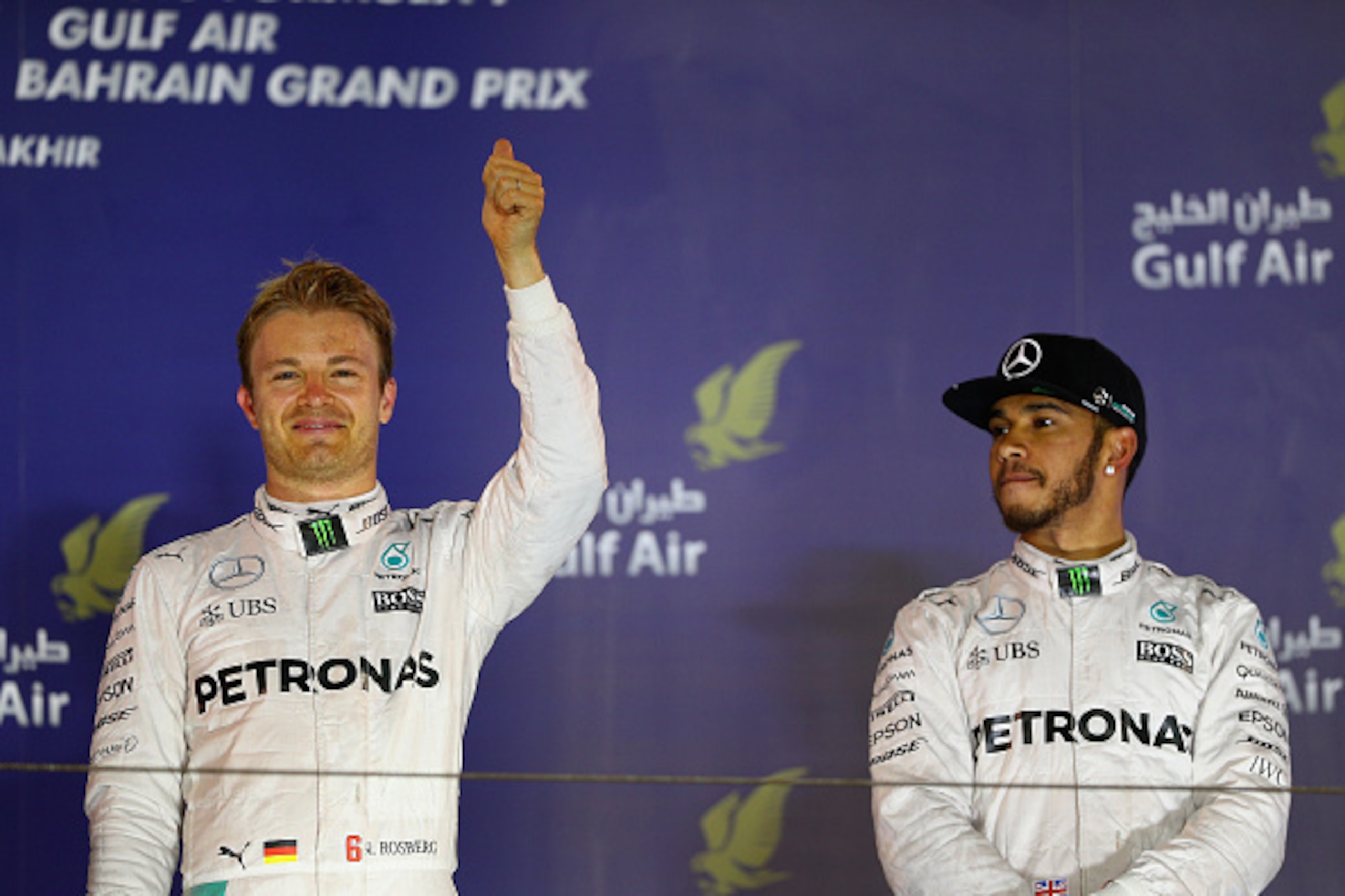SAKHIR, BAHRAIN - APRIL 03: Nico Rosberg of Germany and Mercedes GP celebrates his win on the podium with Lewis Hamilton of Great Britain and Mercedes GP during the Bahrain Formula One Grand Prix at Bahrain International Circuit on April 3, 2016 in Sakhir