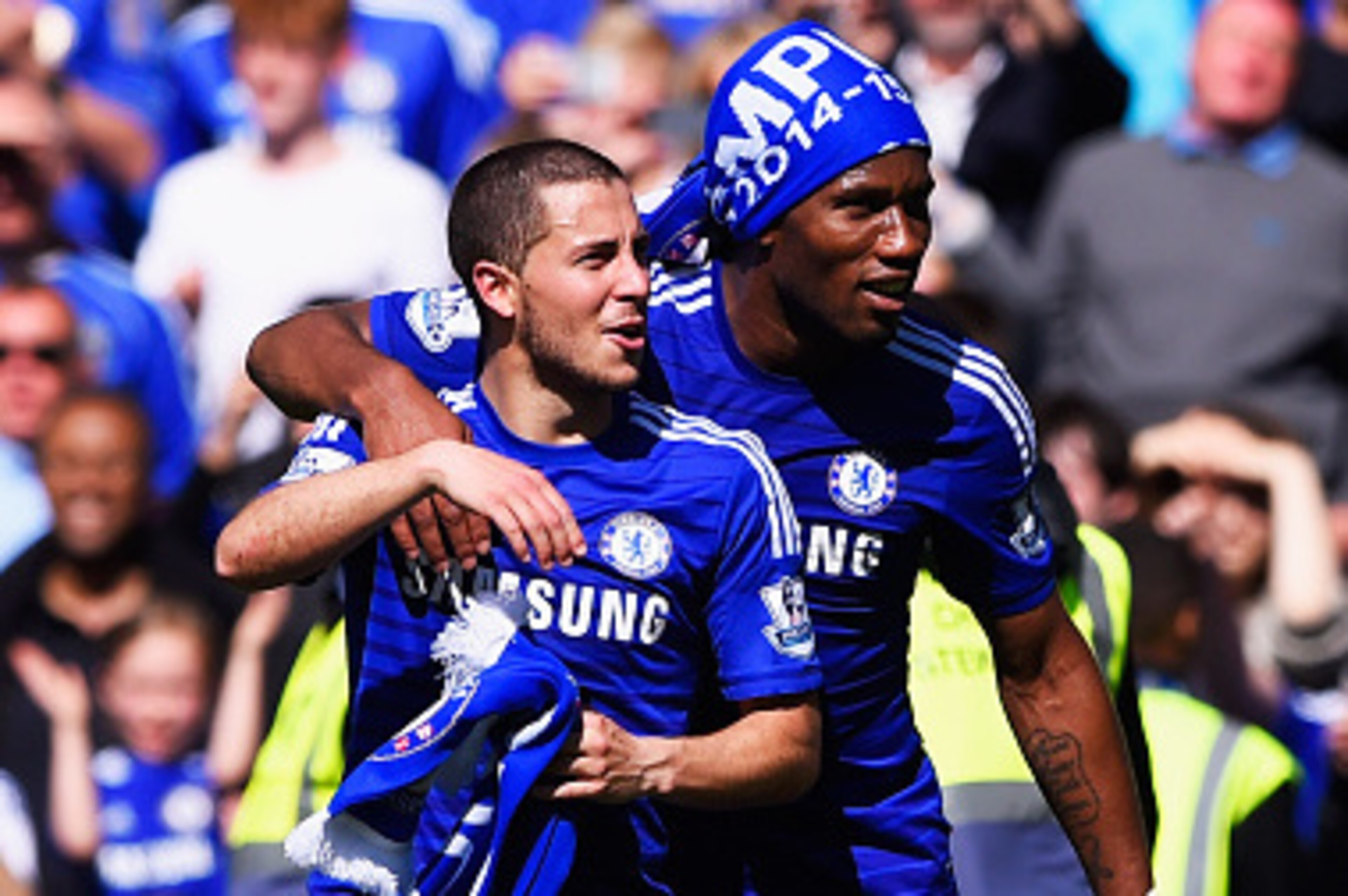 LONDON, ENGLAND - MAY 03: Eden Hazard (L) and Didier Drogba of Chelsea celebrate winning the Premier League title after the Barclays Premier League match between Chelsea and Crystal Palace at Stamford Bridge on May 3, 2015 in London, England. Chelsea bec LONDON, ENGLAND - MAY 03: Eden Hazard (L) and Didier Drogba of Chelsea celebrate winning the Premier League title after the Barclays Premier League match between Chelsea and Crystal Palace at Stamford Bridge on May 3, 2015 in London, England. Chelsea bec