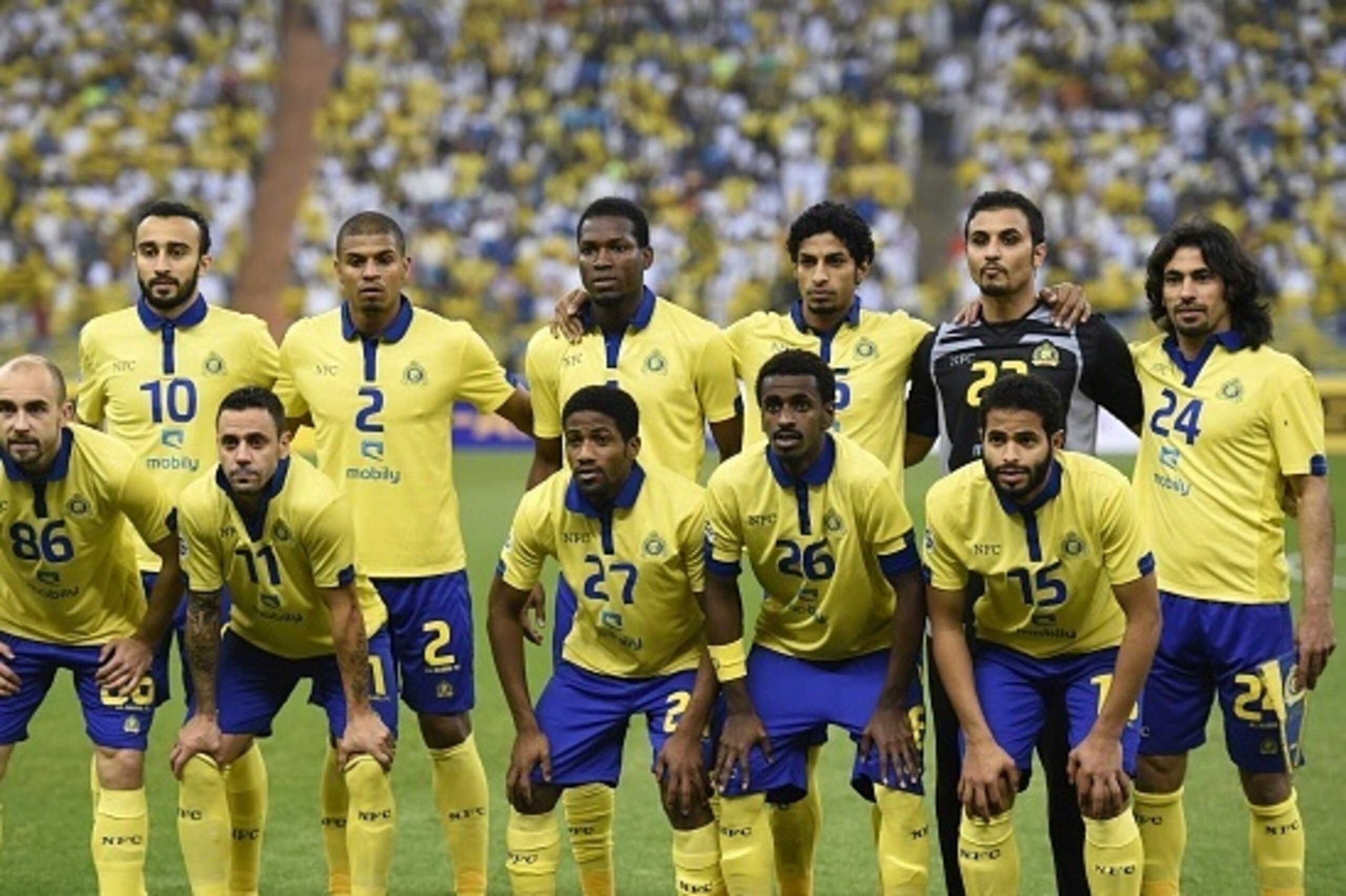 Saudi's Al-Nassr team pose for a team photo prior to their AFC Champions League group A football match against Iran's Persepolis team at the King Fahad stadium in Riyadh, on March 17, 2015. AFP PHOTO / FAYEZ NURELDINE (Photo credit should read FAYE Saudi's Al-Nassr team pose for a team photo prior to their AFC Champions League group A football match against Iran's Persepolis team at the King Fahad stadium in Riyadh, on March 17, 2015. AFP PHOTO / FAYEZ NURELDINE (Photo credit should read FAYE