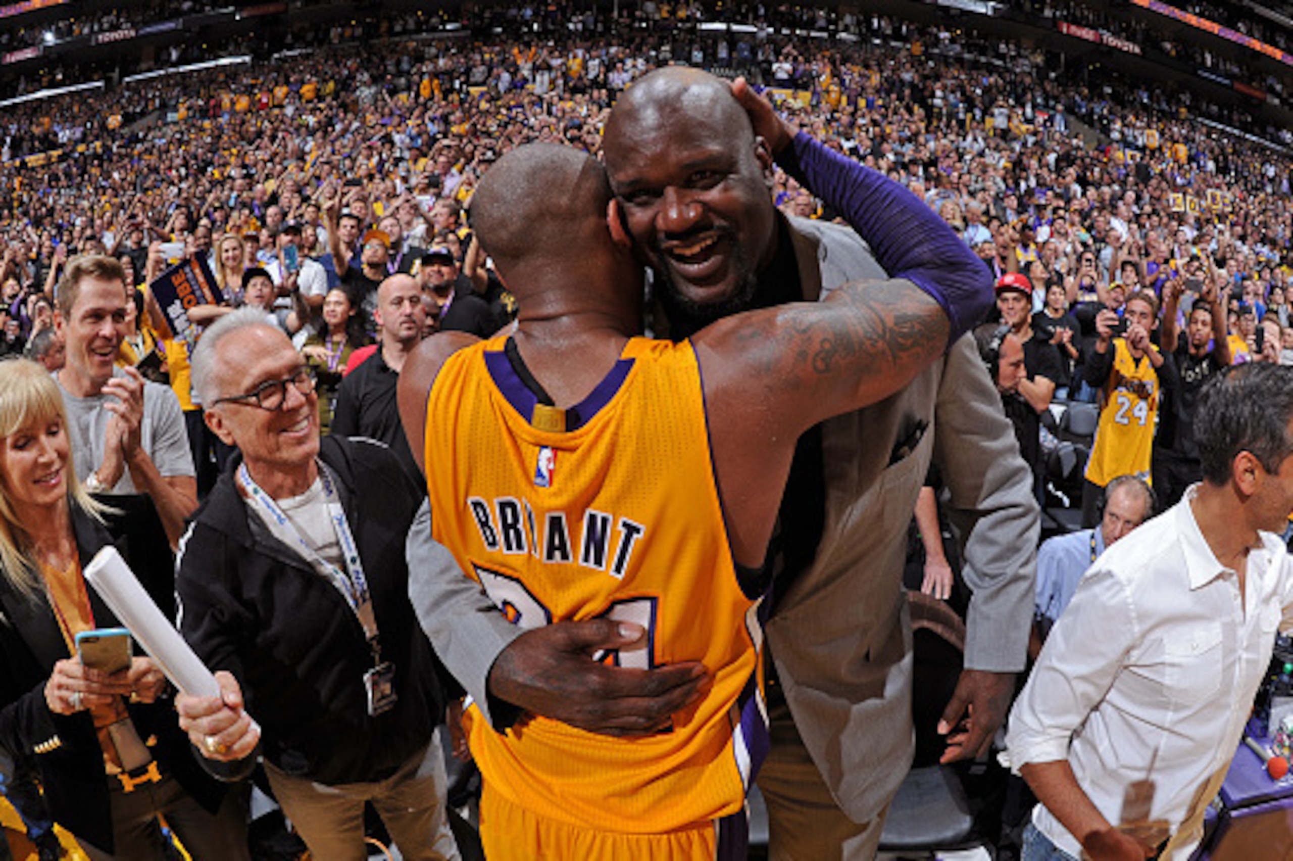 LOS ANGELES, CA - APRIL 13:  NBA Legend, Shaquille O'Neal and Kobe Bryant #24 of the Los Angeles Lakers hug after the game against the Utah Jazz on April 13, 2016 at Staples Center in Los Angeles, California. NOTE TO USER: User expressly acknowledges and 