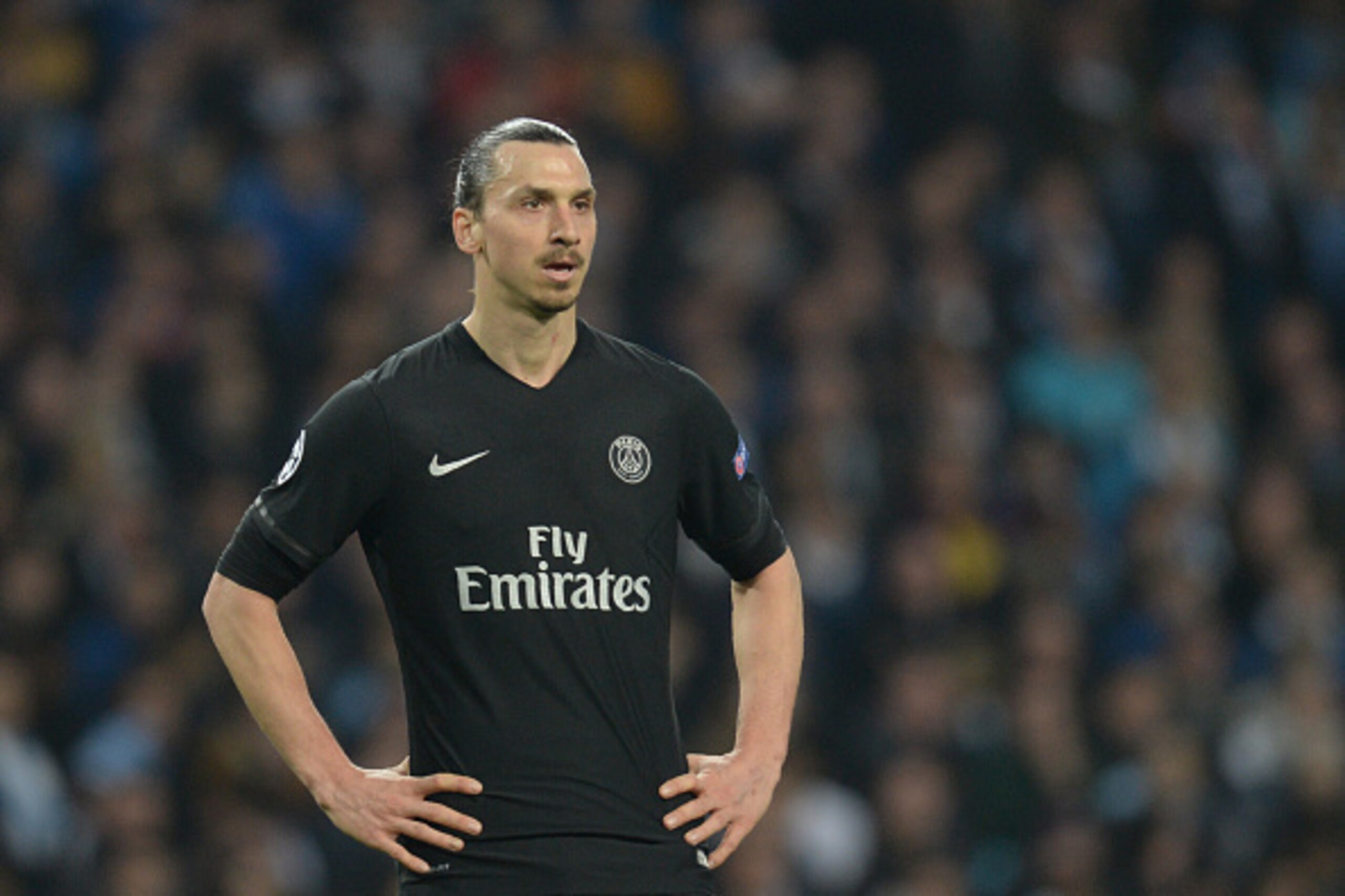 Paris Saint-Germain's Swedish forward Zlatan Ibrahimovic reacts during the UEFA Champions league quarter-final second leg football match between Manchester City and Paris Saint-Germain at the Etihad stadium in Manchester on April 12, 2016. / AFP / OLI SCA Paris Saint-Germain's Swedish forward Zlatan Ibrahimovic reacts during the UEFA Champions league quarter-final second leg football match between Manchester City and Paris Saint-Germain at the Etihad stadium in Manchester on April 12, 2016. / AFP / OLI SCA