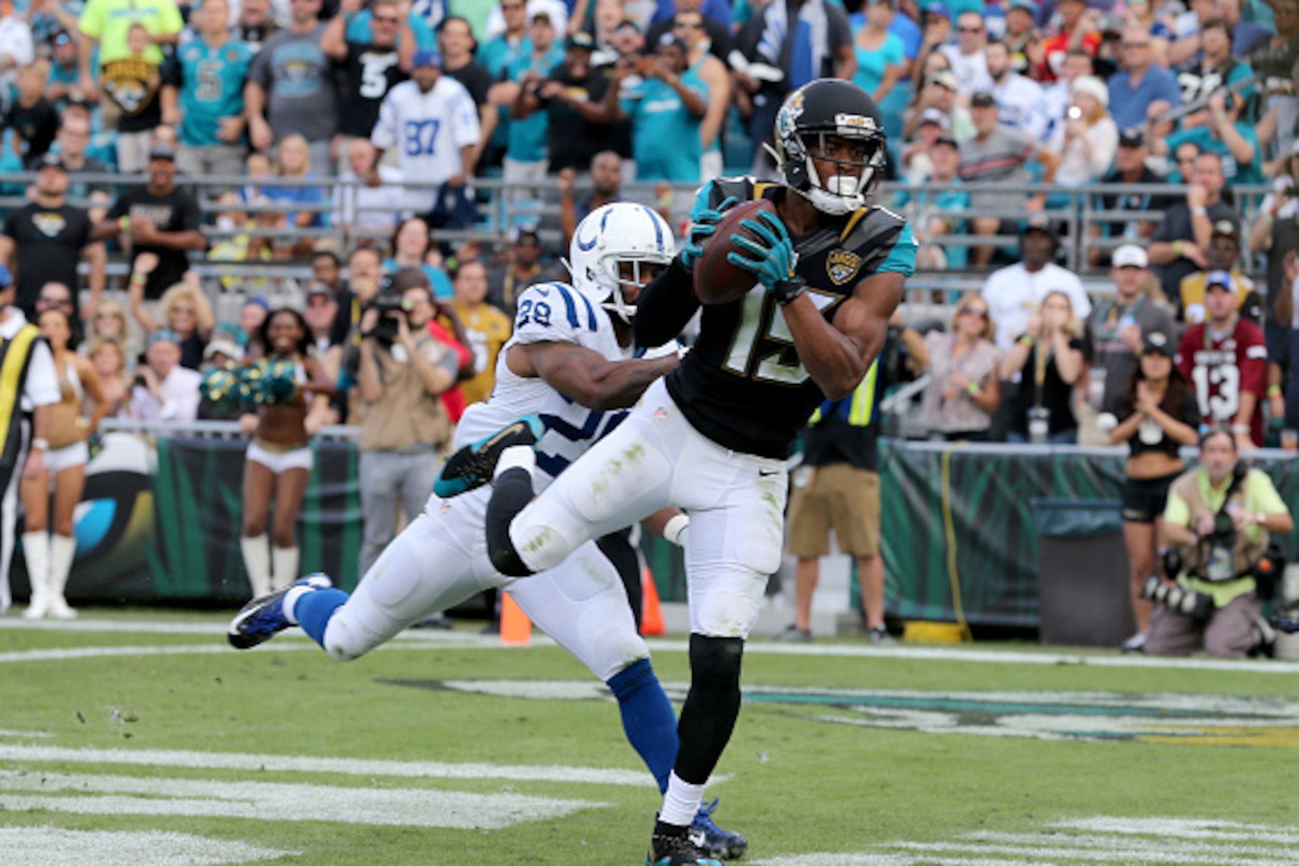 JACKSONVILLE, FL - DECEMBER 13:  Allen Robinson #15 of the Jacksonville Jaguars crosses the goal line for a touchdown during the game against the Indianapolis Colts at EverBank Field on December 13, 2015 in Jacksonville, Florida.  (Photo by Sam Greenwood/