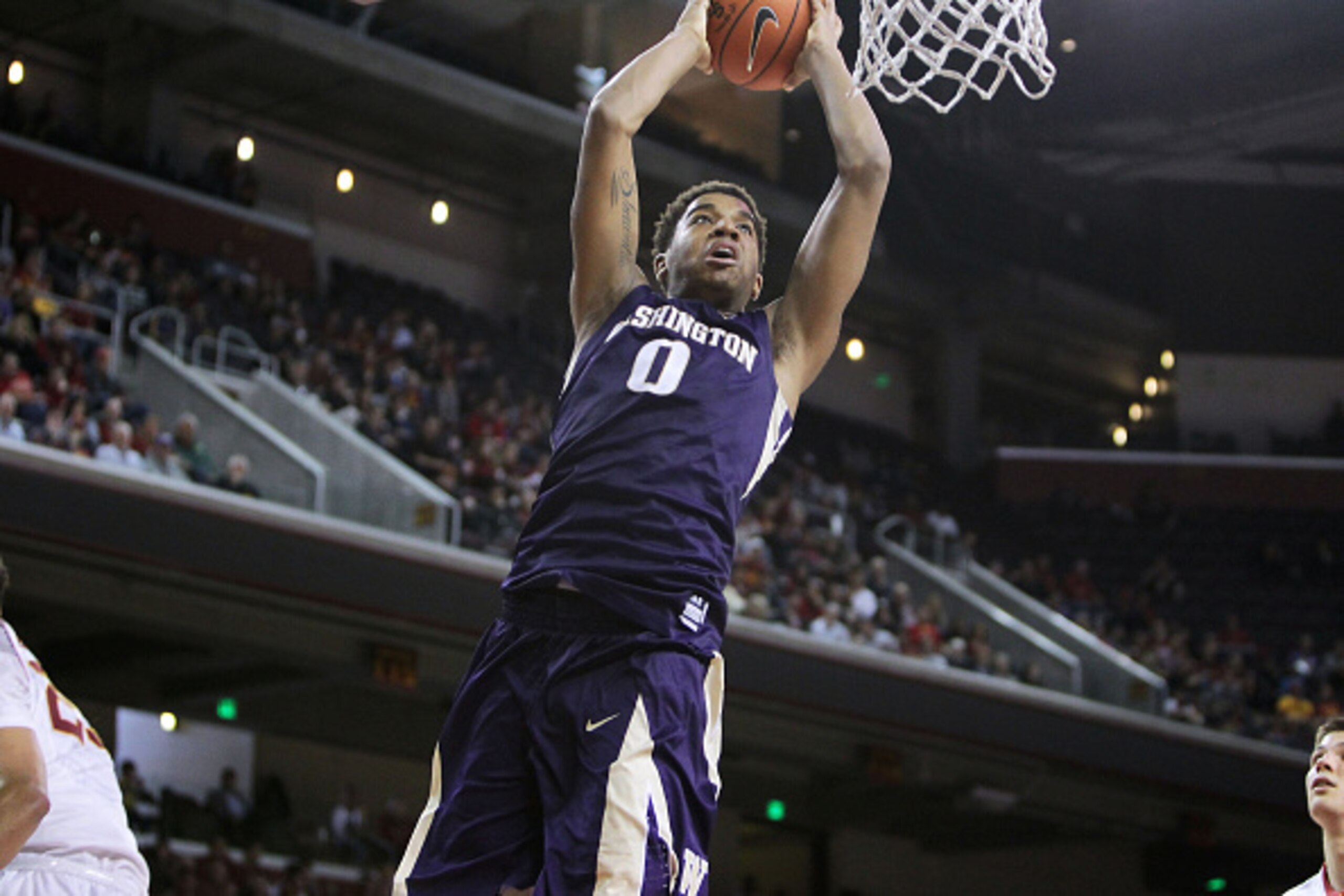 LOS ANGELES, CA - JANUARY 30: Marquese Chriss #0 of the Washington Huskies goes for a dunk against the USC Trojans during a NCAA college basketball game at Galen Center on January 30, 2016 in Los Angeles, California. (Photo by Leon Bennett/Getty Images)