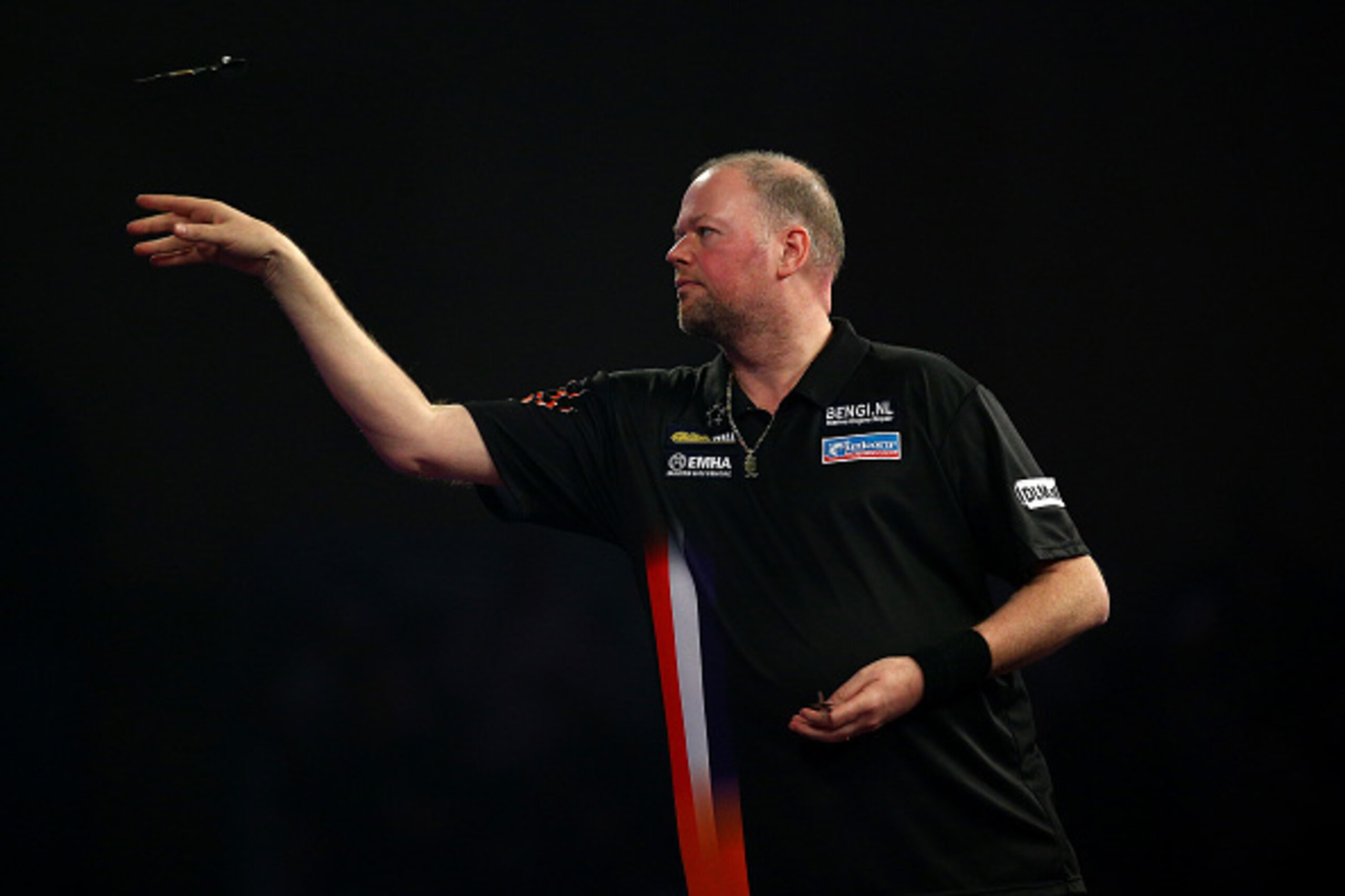 LONDON, ENGLAND - JANUARY 02: Raymond van Barneveld of The Netherlands in action during his semi-final match against Adrian Lewis of England during the 2016 William Hill PDC World Darts Championships on Day Four at Alexandra Palace on January 02, 2016 in 