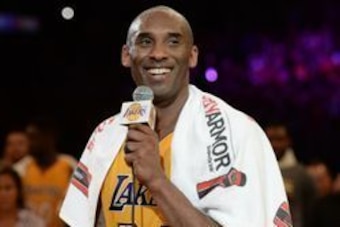 Apr 13, 2016; Los Angeles, CA, USA; Los Angeles Lakers forward Kobe Bryant (24) smiles as he addresses the crowd after the Lakers defeat of the Utah Jazz in the final game of his career at Staples Center. Mandatory Credit: Robert Hanashiro-USA TODAY Sport