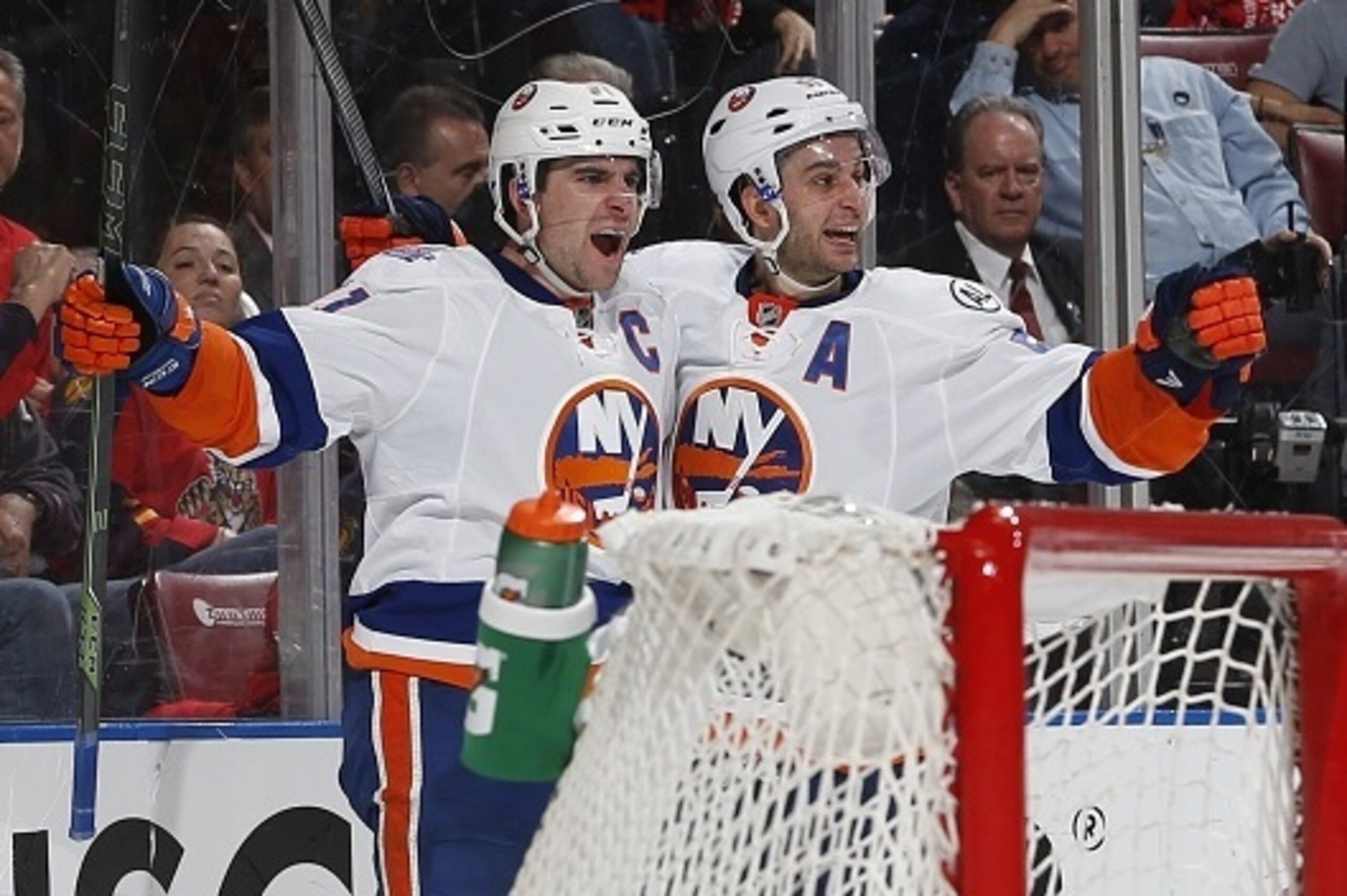 SUNRISE, FL - APRIL 14: John Tavares #91 celebrates his second period goal with Frans Nielsen #51 of the New York Islanders against the Florida Panthers in Game One of the Eastern Conference Quarterfinals during the NHL 2016 Stanley Cup Playoffs at the BB