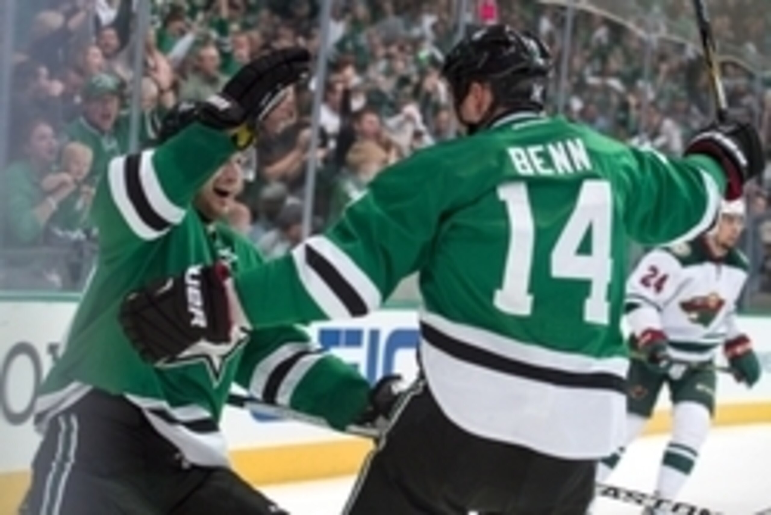 Apr 14, 2016; Dallas, TX, USA; Dallas Stars center Jason Spezza (90) and left wing Jamie Benn (14) celebrate Spezza's goal scored against the Minnesota Wild during the second period in game one of the first round of the 2016 Stanley Cup Playoffs at Americ