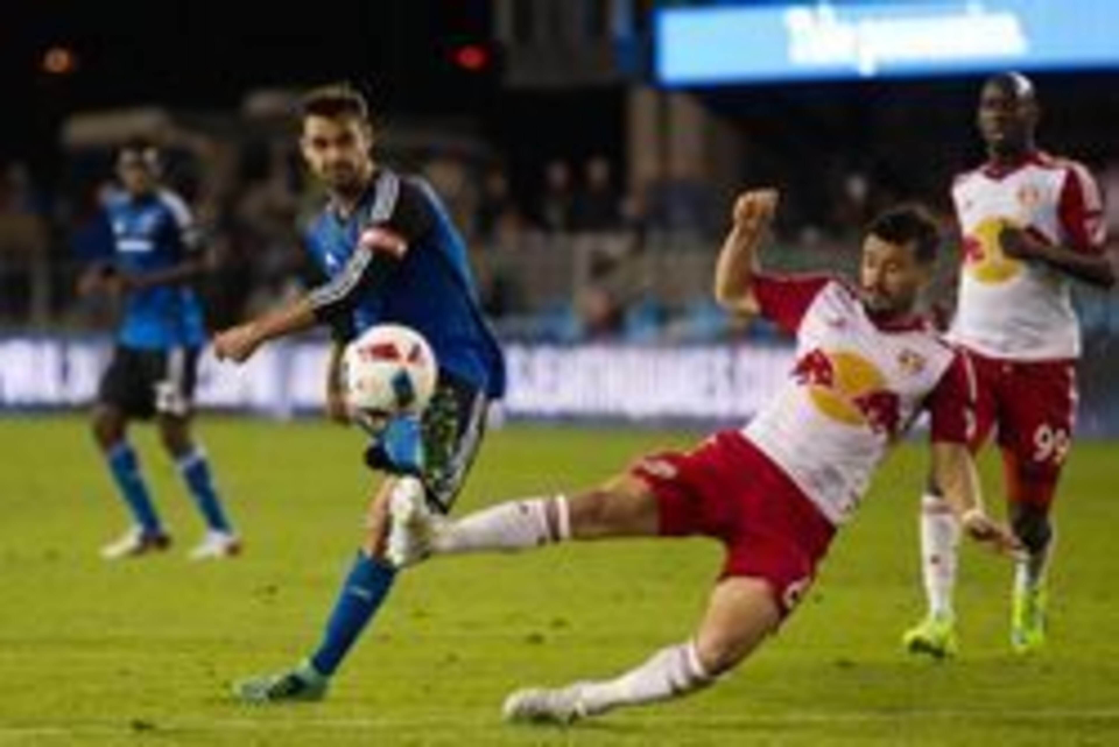Apr 13, 2016; San Jose, CA, USA; San Jose Earthquakes forward Chris Wondolowski (8) kicks the ball against New York Red Bulls midfielder Felipe Martins (8) during the second half at Avaya Stadium. The San Jose Earthquakes defeated the New York Red Bulls 2