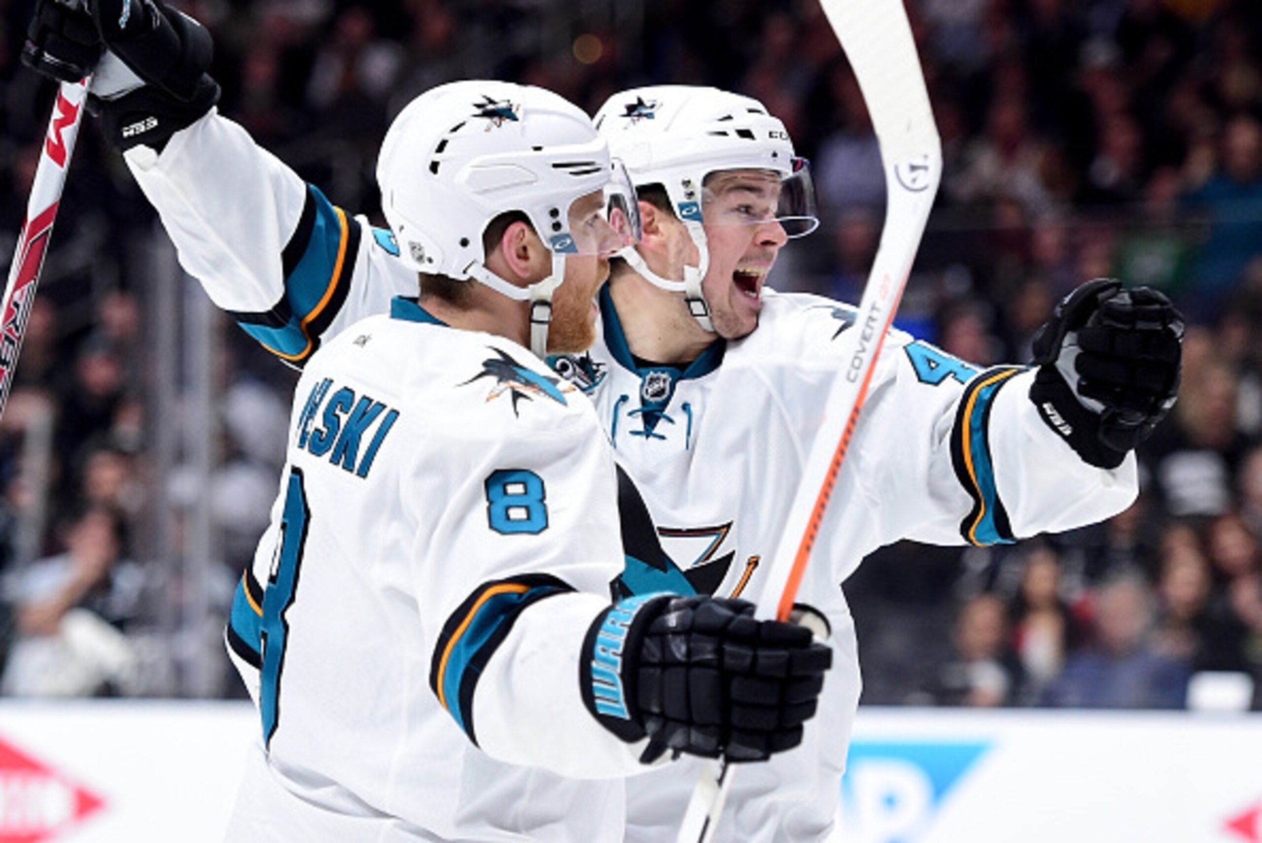 LOS ANGELES, CA - APRIL 14:  Joe Pavelski #8 of the San Jose Sharks celebrates his goal with Tomas Hertl #48 ato take a 4-3 lead during the third period of a 4-3 Sharks win in Game One of the Western Conference Quarterfinals during the 2015 NHL Stanley Cu