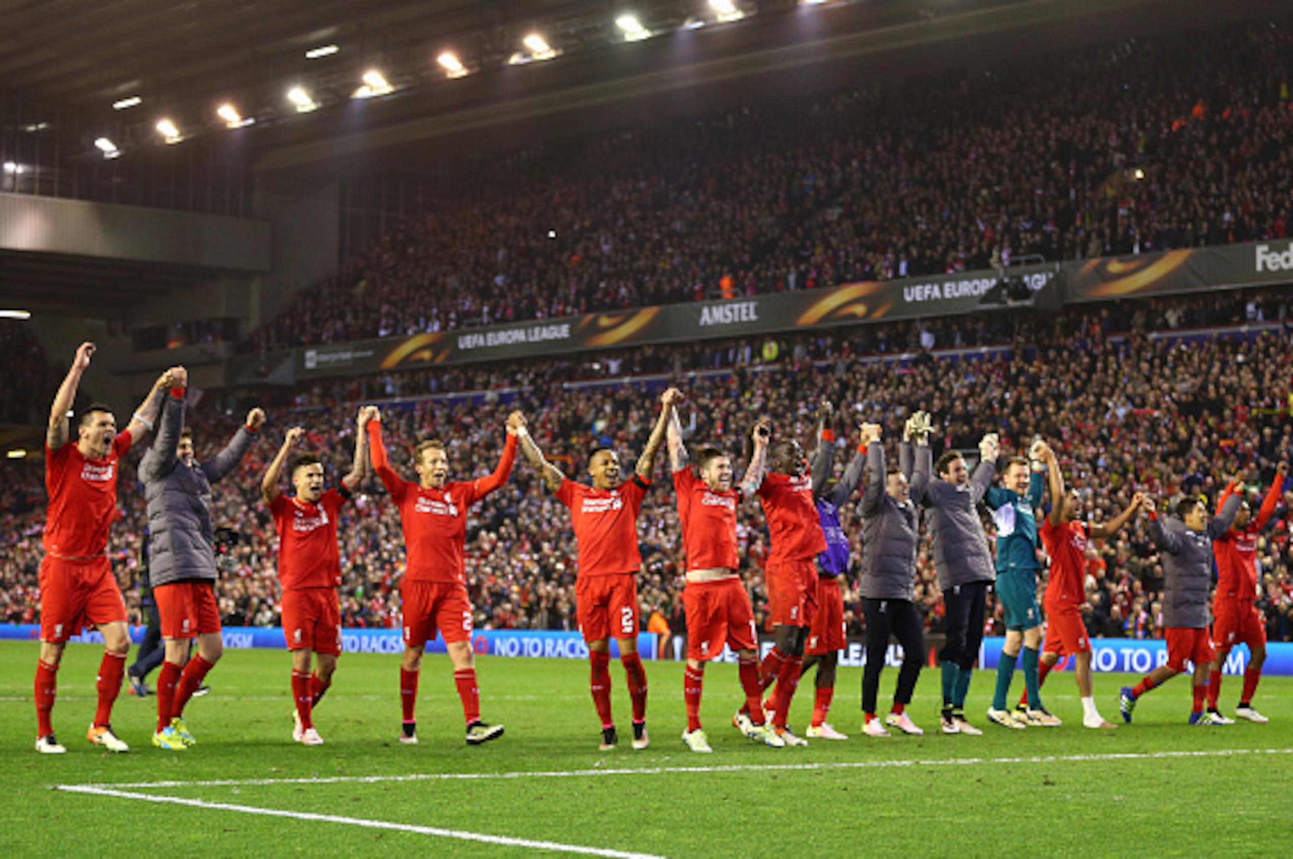 LIVERPOOL, ENGLAND - APRIL 14:  Liverpool players celebrate victory after the UEFA Europa League quarter final, second leg match between Liverpool and Borussia Dortmund at Anfield on April 14, 2016 in Liverpool, United Kingdom.  (Photo by Clive Brunskill/