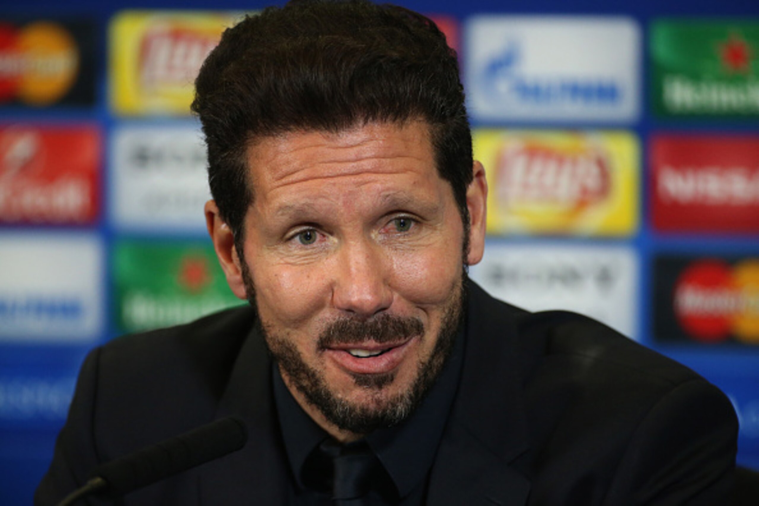 MADRID, SPAIN - APRIL 13: Coach of Atletico Madrid Diego Simeone answers to the media during a press conference following the UEFA Champions League quarter final second leg match between Atletico Madrid and FC Barcelona at Vicente Calderon stadium on Apri