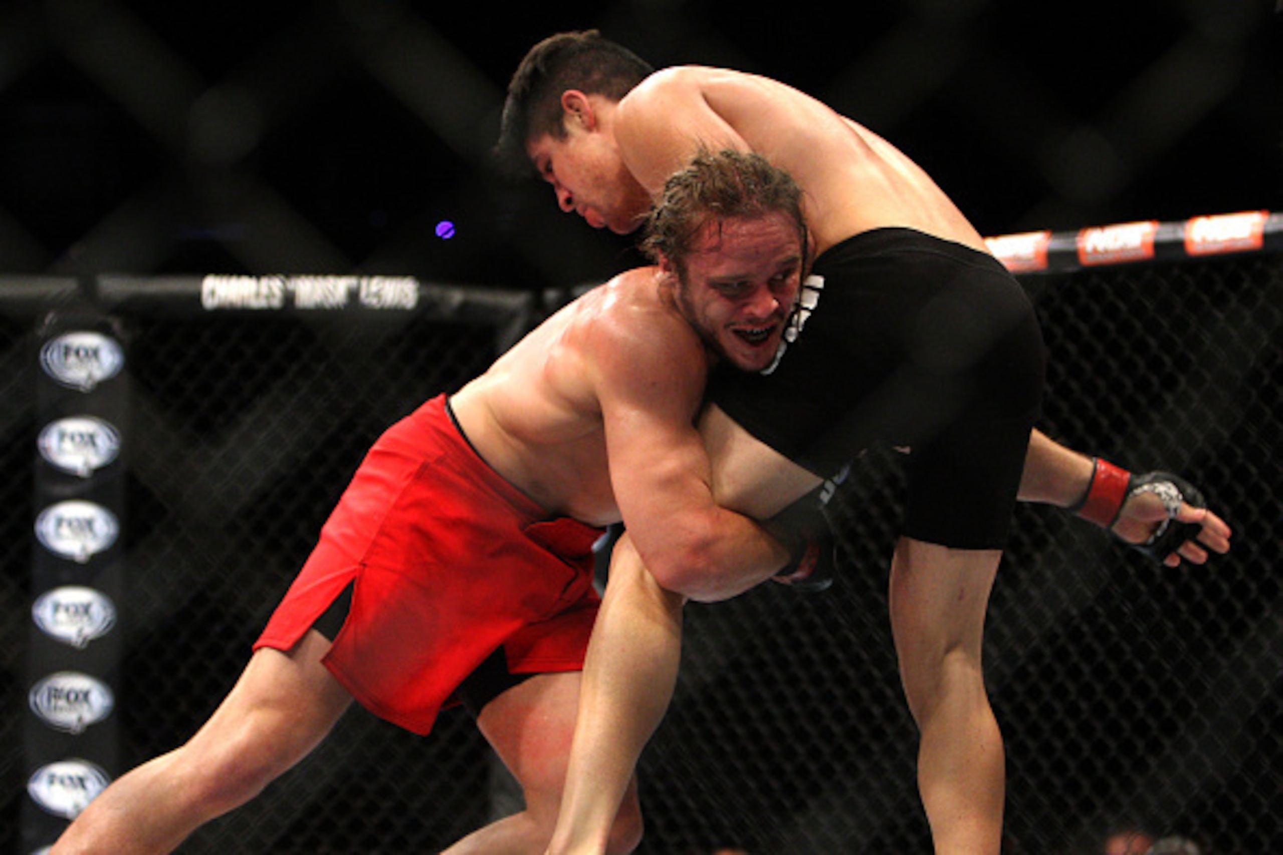 LAS VEGAS, NV - JULY 12:  (L-R) Michael Graves attempts to take down Vicente Luque in their welterweight bout during the Ultimate Fighter Finale inside MGM Grand Garden Arena on July 12, 2015 in Las Vegas, Nevada.  (Photo by Mitch Viquez/Zuffa LLC/Zuffa L