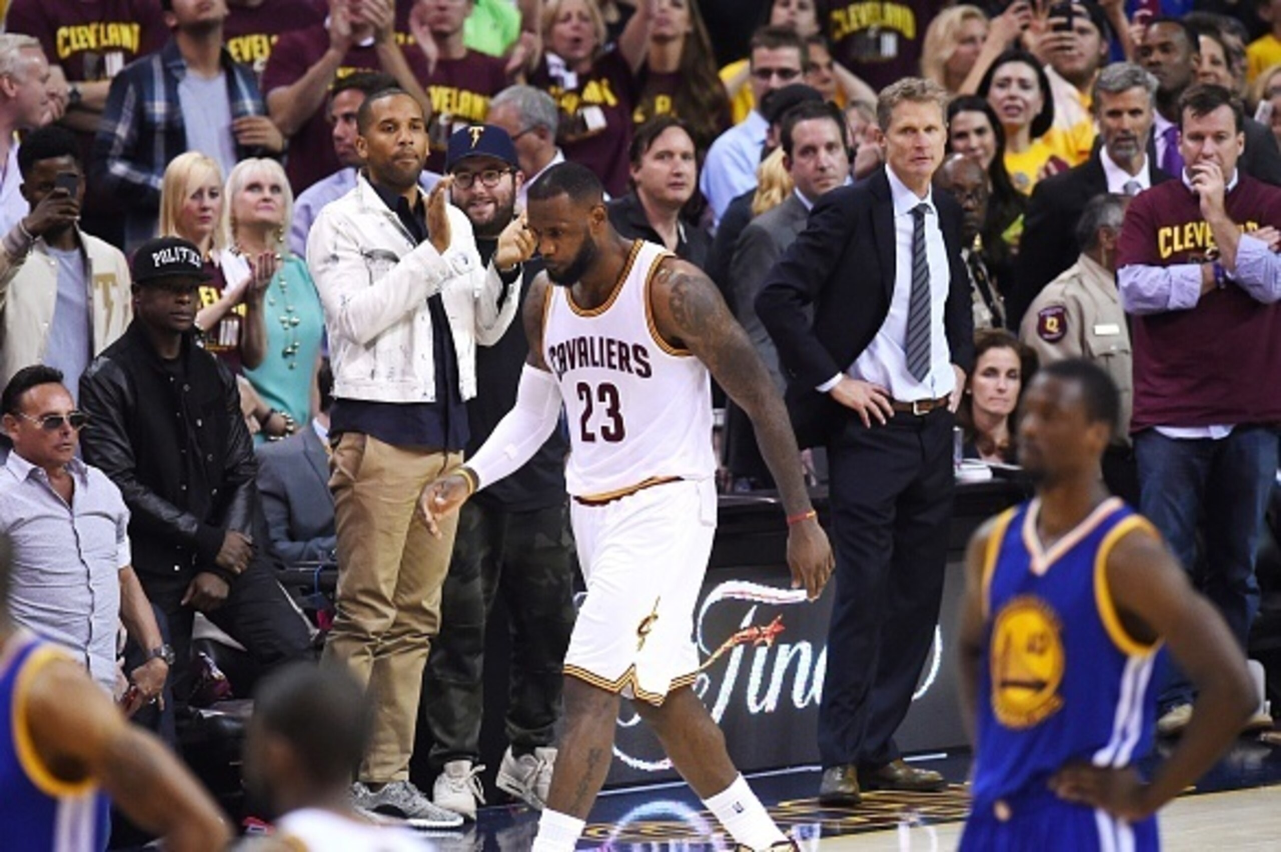 Cleveland Cavaliers LeBron James walks off the court in the final seconds of the game against the Golden State Warriors in Game 6 to win the 2015 NBA Finals on June 16, 2015 at the Quicken Loans Arena in Cleveland, Ohio. The Warriors took the best-of-seve