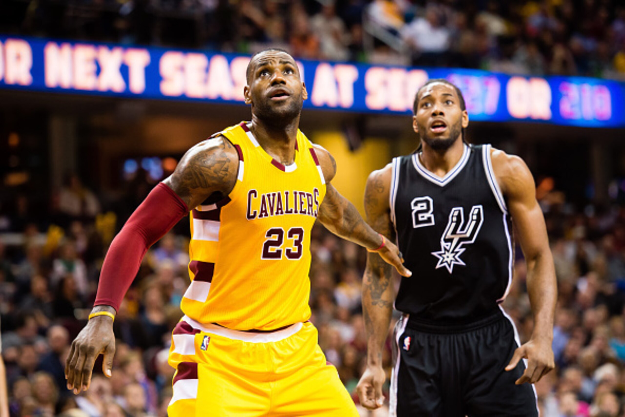 CLEVELAND, OH - JANUARY 30: LeBron James #23 of the Cleveland Cavaliers and Kawhi Leonard #2 of the San Antonio Spurs wait for a rebound during the second half at Quicken Loans Arena on January 30, 2016 in Cleveland, Ohio. The Cavaliers defeated the Spurs
