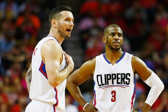 HOUSTON, TX - MARCH 16:  J.J. Redick #4 and Chris Paul #3 of the Los Angeles Clippers wait on the court during their game against the Houston Rockets at the Toyota Center on March 16, 2016 in Houston, Texas.  NOTE TO USER: User expressly acknowledges and 