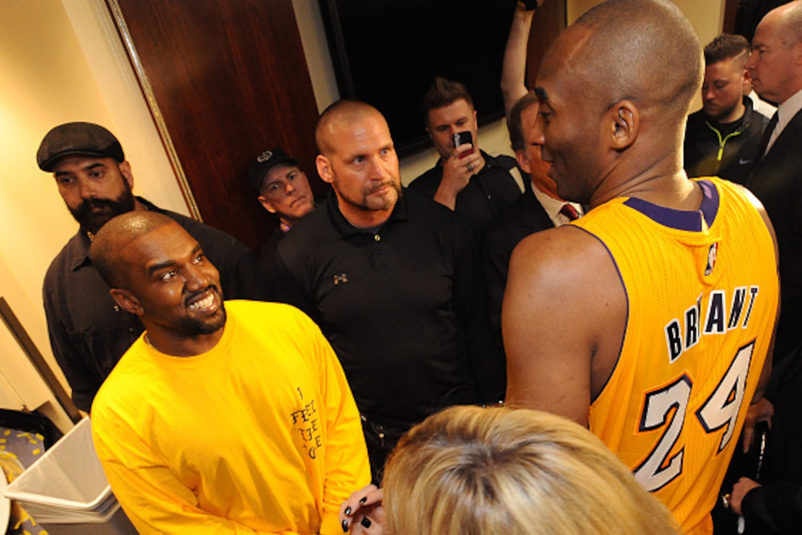 LOS ANGELES, CA - APRIL 13:  Rapper, Kanye West talks to Kobe Bryant #24 of the Los Angeles Lakers after the game on April 13, 2016 at Staples Center in Los Angeles, California. NOTE TO USER: User expressly acknowledges and agrees that, by downloading and