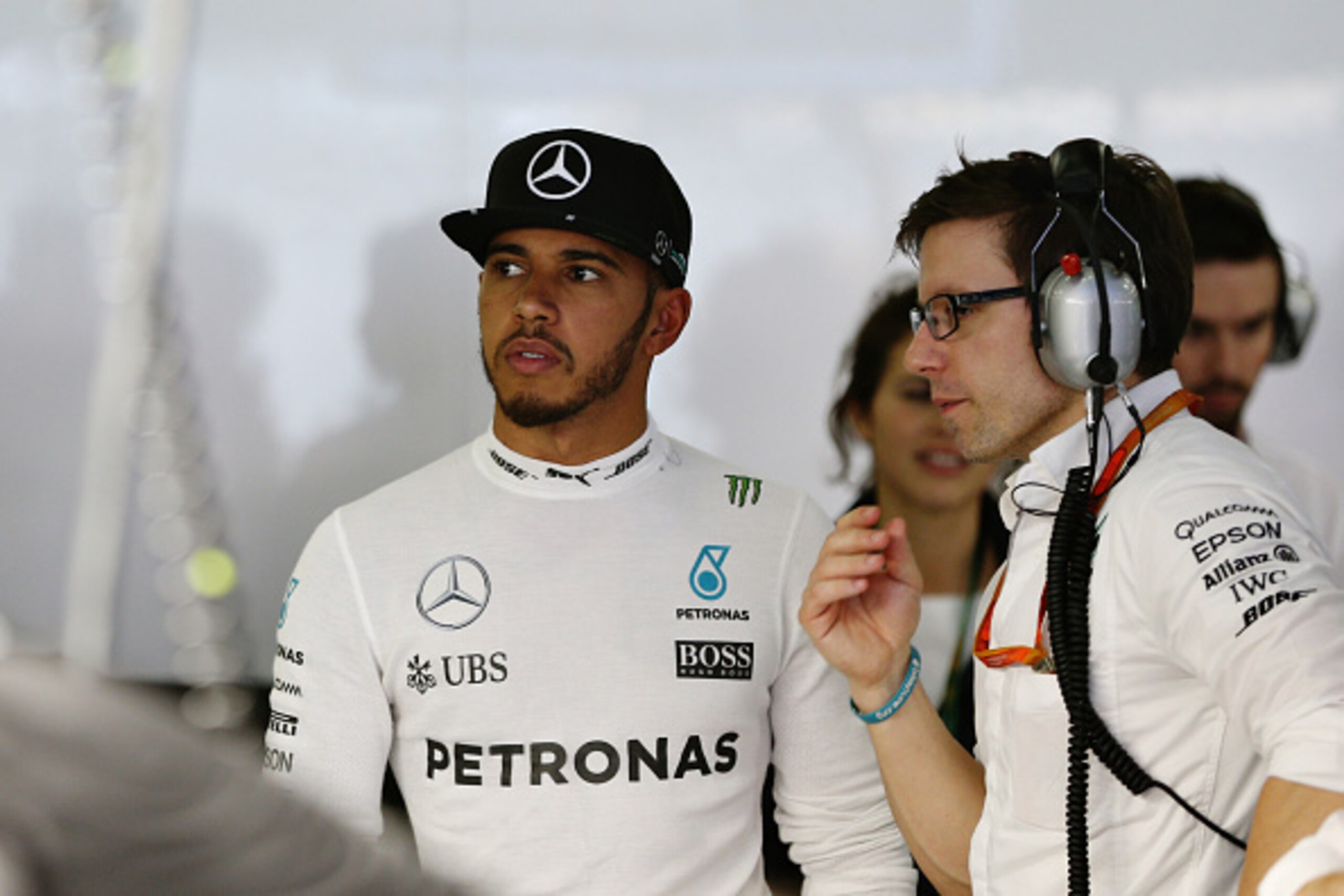 SHANGHAI, CHINA - APRIL 16: Lewis Hamilton of Great Britain and Mercedes GP talks to his engineer, Peter Bonnington in the garage during qualifying for the Formula One Grand Prix of China at Shanghai International Circuit on April 16, 2016 in Shanghai, Ch