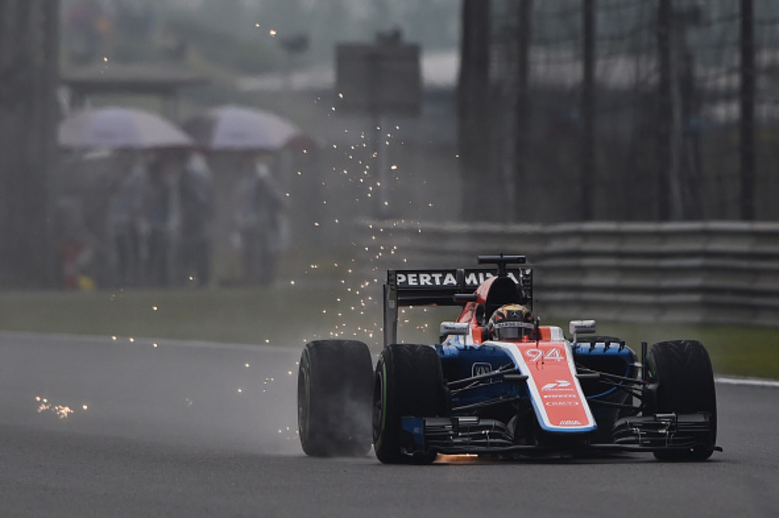 Manor F1 Team's German driver Pascal Wehrlein steers his car during practice for the Formula One Chinese Grand Prix in Shanghai on April 16, 2016. / AFP / GREG BAKER        (Photo credit should read GREG BAKER/AFP/Getty Images)