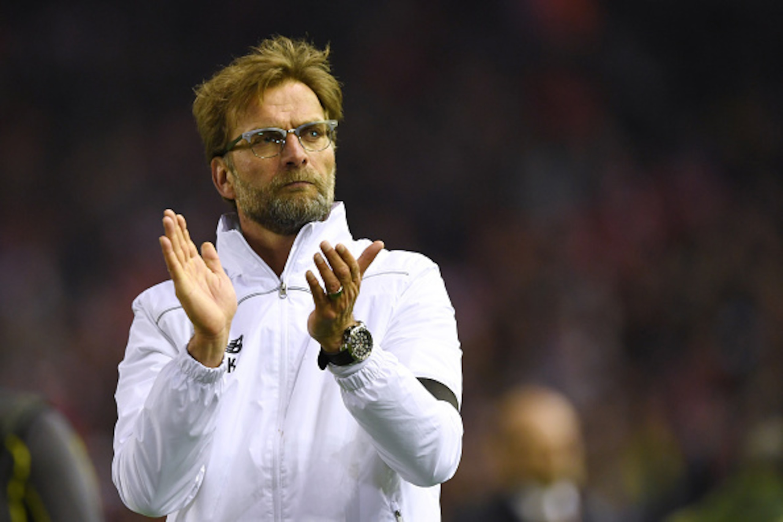 LIVERPOOL, ENGLAND - APRIL 14:  Jurgen Klopp, manager of Liverpool celebrates victory after the UEFA Europa League quarter final, second leg match between Liverpool and Borussia Dortmund at Anfield on April 14, 2016 in Liverpool, United Kingdom.  (Photo b
