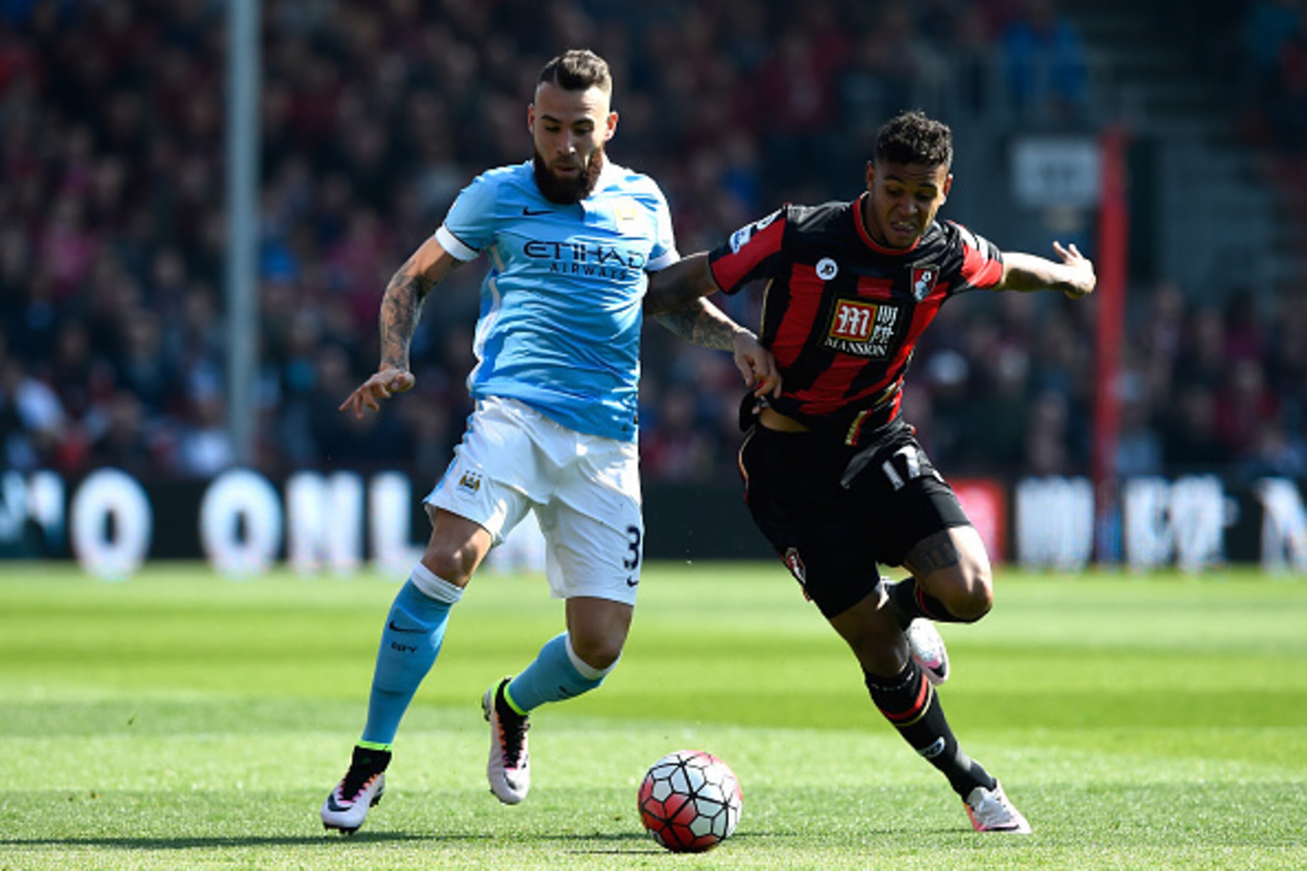 BOURNEMOUTH, ENGLAND - APRIL 02:  Nicolas Otamendi of Manchester City and Joshua King of Bournemouth compete for the ball during the Barclays Premier League match between A.F.C. Bournemouth and Manchester City at Vitality Stadium on April 2, 2016 in Bourn