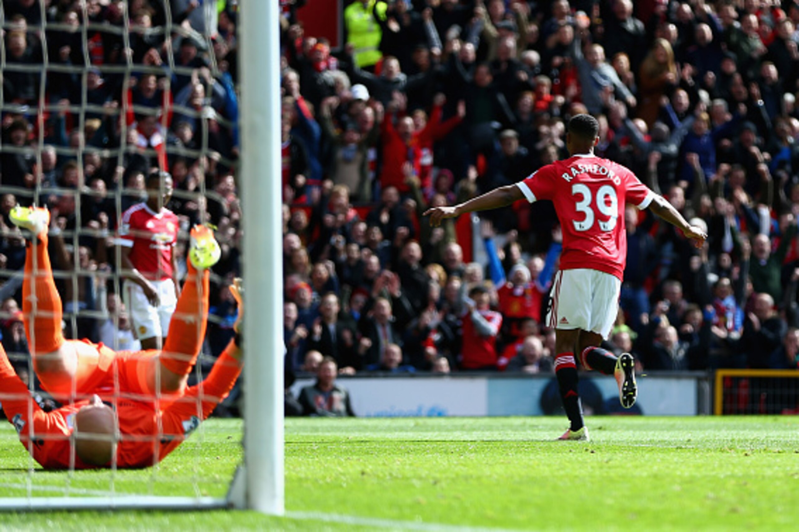 MANCHESTER, ENGLAND - APRIL 16:  Marcus Rashford of Manchester United celebrates scoring his sides first goal during the Barclays Premier League match between Manchester United and Aston Villa at Old Trafford on April 16, 2016 in Manchester, England.  (Ph
