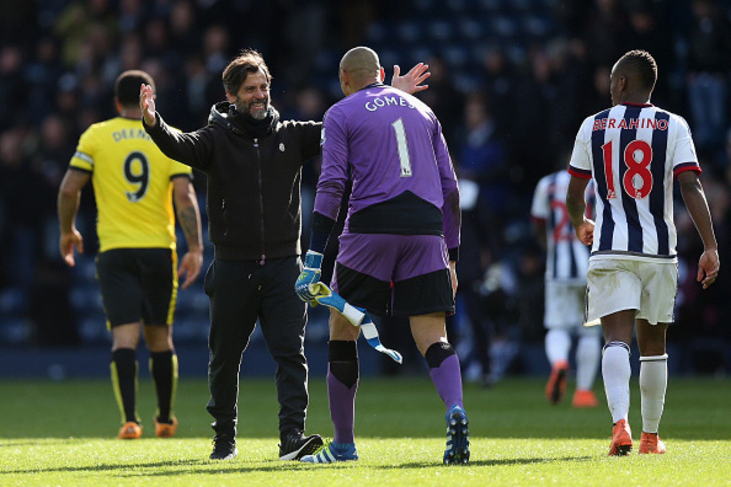 WEST BROMWICH, ENGLAND - APRIL 16:  Quique Flores manager of Watford celebrates with Heurelho Gomes of Watford following his sides victory during the Barclays Premier League match between West Bromwich Albion and Watford at The Hawthorns on April 16, 2016