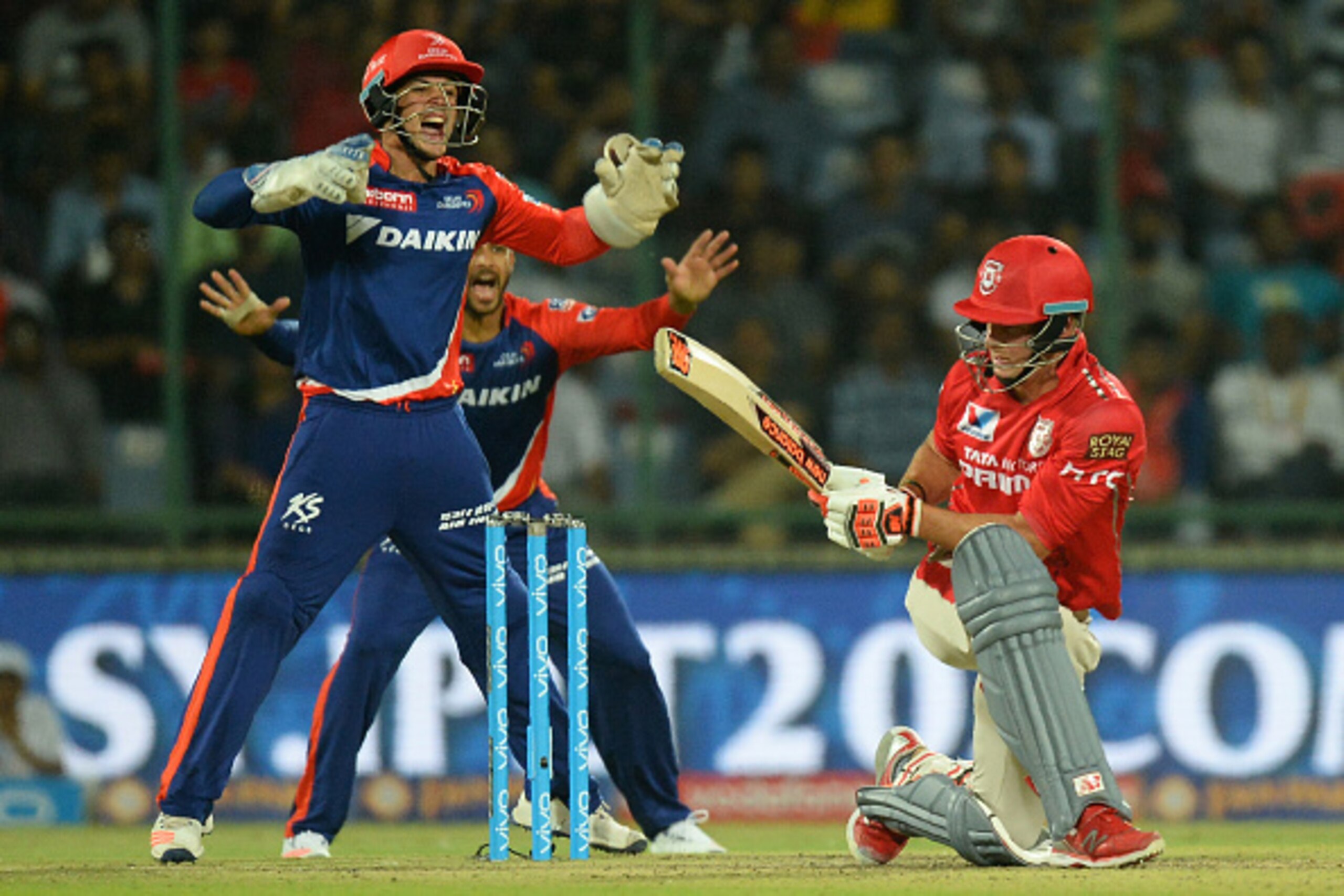 Delhi Daredevils wicketkeeper Quinton De Kock(L)successfully appeals for a leg before wicket (LBW) decision against Kings XI Punjab batsman David Miller(R) during the 2016 Indian Premier League (IPL) Twenty20 cricket match between Delhi Daredevils and Kin
