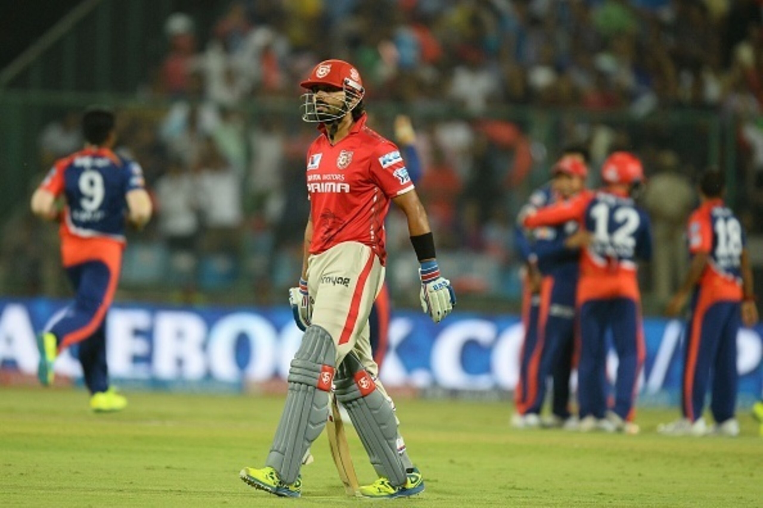 Kings XI Punjab batsman Murali Vijay walks back to the pavilion after his dismissal during the 2016 Indian Premier League (IPL) Twenty20 cricket match between Delhi Daredevils and Kings XI Punjab at The Feroz Shah Kotla Cricket Stadium in New Delhi on Apr