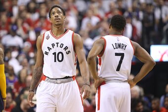 TORONTO, CANADA - APRIL 16: DeMar DeRozan #10 of the Toronto Raptors and Kyle Lowry #7 of the Toronto Raptors look on against the Indiana Pacers in Game One of the Eastern Conference Quarterfinals during the 2016 NBA Playoffs on April 16, 2016 at the Air 