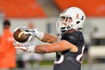 Nov 29, 2014; Miami Gardens, FL, USA; Miami Hurricanes wide receiver Braxton Berrios (83) warms up before a game against Pittsburgh Panthers at Sun Life Stadium. Mandatory Credit: Steve Mitchell-USA TODAY Sports
