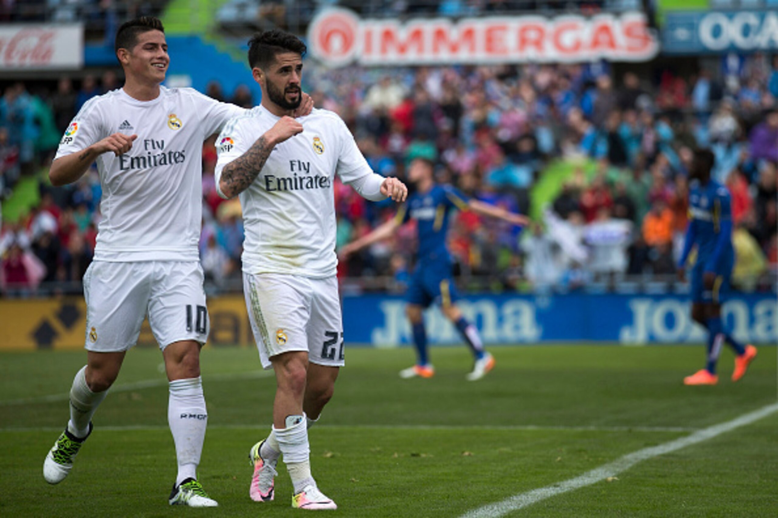 GETAFE, SPAIN - APRIL 16:  Francisco Roman Alarcon alias Isco (R) of Real Madrid CF celebrates scoring their second goal with teammate James Rodriguez (L)  during the La Liga match between Getafe CF and Real Madrid CF at Coliseum Alfonso Perez on April 16