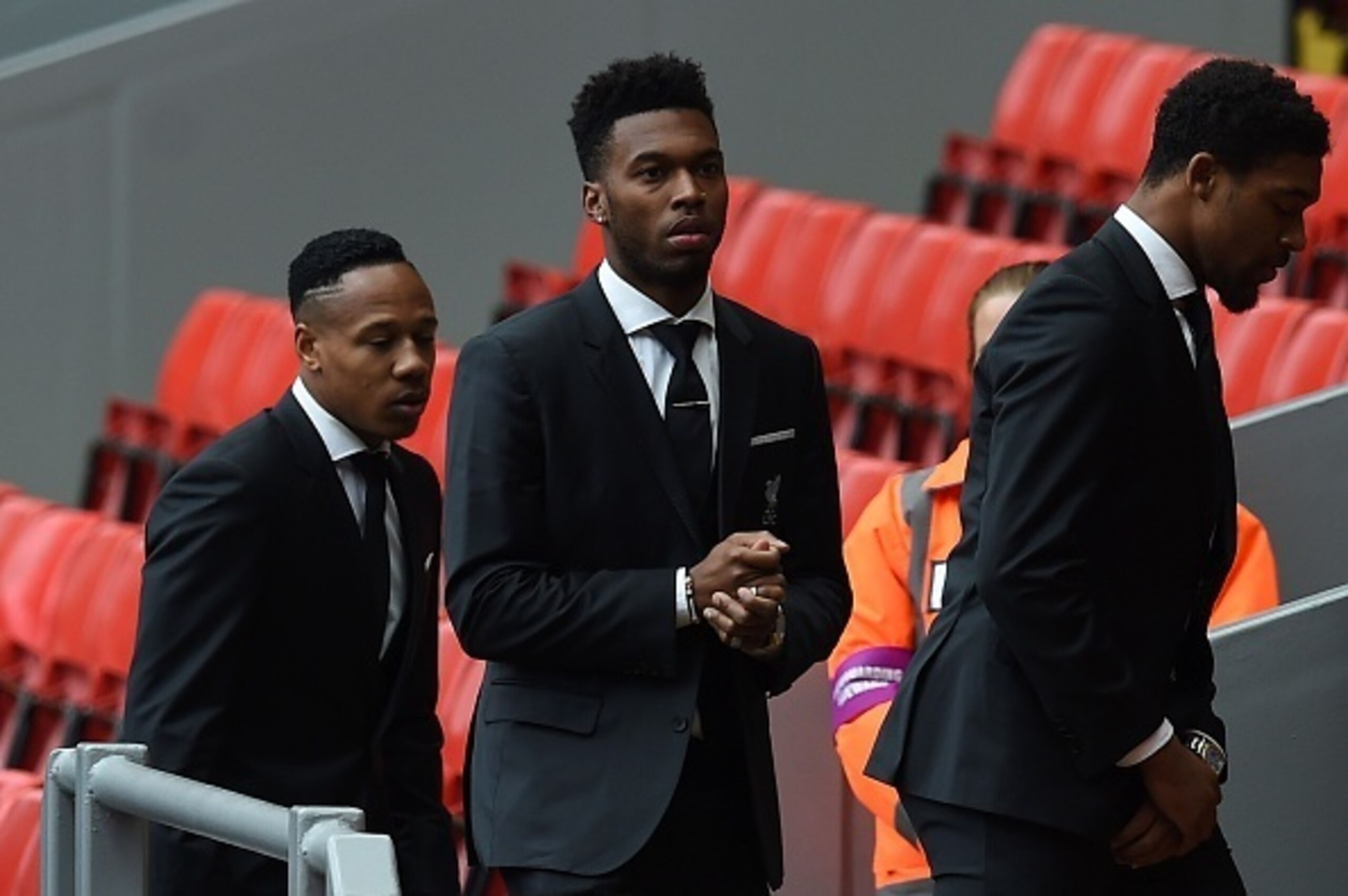 Liverpool's English striker Daniel Sturridge (C) arrives to attends a memorial service at Anfield in Liverpool, north west England on April 15, 2016, on the 27th anniversary of the Hillsborough Disaster.
96 Liverpool supporters died at the 1989 FA Cup sem